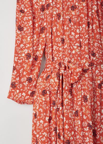 ChloÃ© Maxi dress in orange adorned with a floral motif 