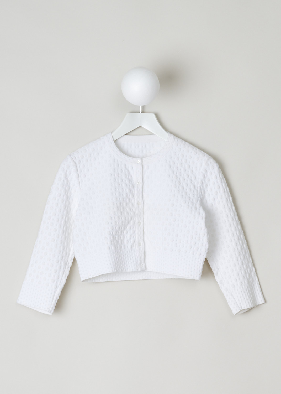AlaÃ¯a, Bubble woven bolero, 5S9VA19CM158_cardigan_toffee_blanc_C000, white, front, A lovely white bolero featuring a unique weaving pattern which gives the fabric a bubbly look. Further this model has a cropped length, long sleeves and round neckline. The fastening option here are the buttons on the front. 