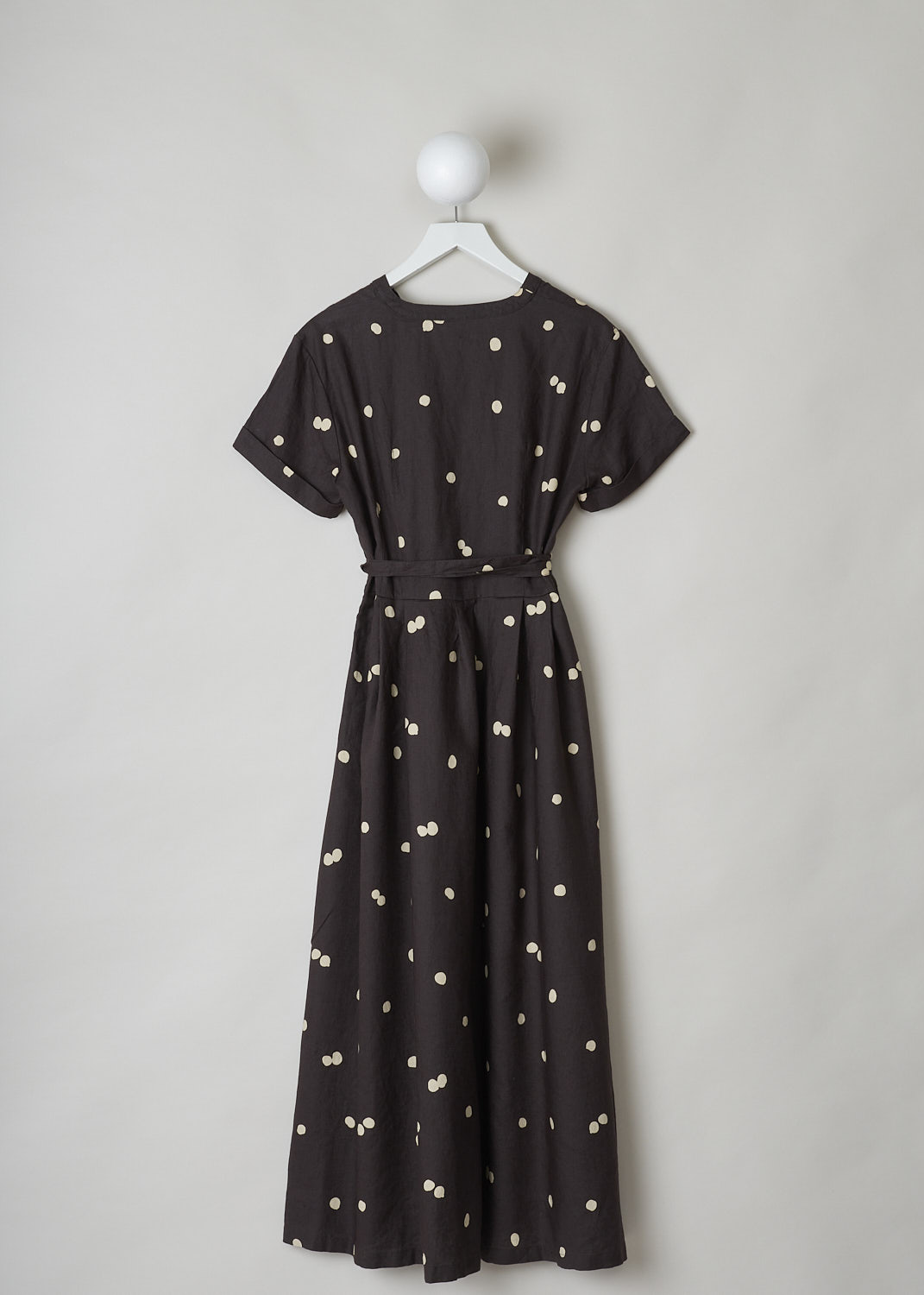 ASPESI, BROWN LINEN MAXI DRESS WITH DOTTED PRINT, 2958_M277_62331, Brown, Print, Back, This chocolate brown linen dress has a off-white dotted print throughout. The dress has a modest V-neckline and w three-button closure in the front. The dress has short sleeves with rolled cuffs. An attached belt can be used to cinch in the waist. A concealed side zip functions as the closure option. Slanted pockets re concealed in the side seam. The dress has a straight hemline.
