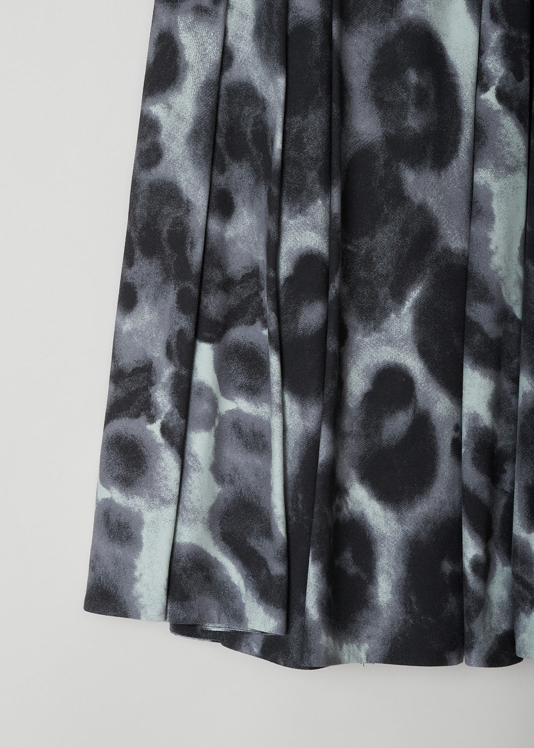ASPESI, FADED ANIMAL PRINT SKIRT, 2217_V129_02189, Black, Print, Detail, This pleated midi skirt has a faded animal print. This skirt is fully lined and has a button and concealed side zip closure. 
