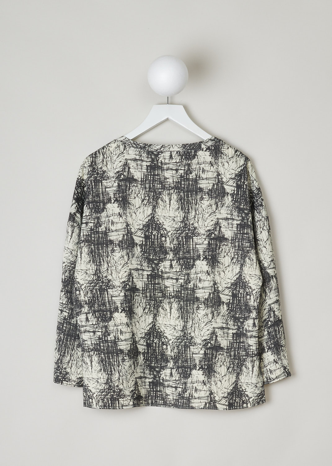 ASPESI, LONG SLEEVE SCRIBBLE PRINT TOP, 5619_V128_60042, Print, Black, White, Back, This top has an off-white base with a black scribble print allover. The top features a round neckline and long sleeves with small slits. In the front, the top has a rounded hemline with side slits. In the back, the hemline is straight. This model has an asymmetric finish, meaning the back is longer than the front.

