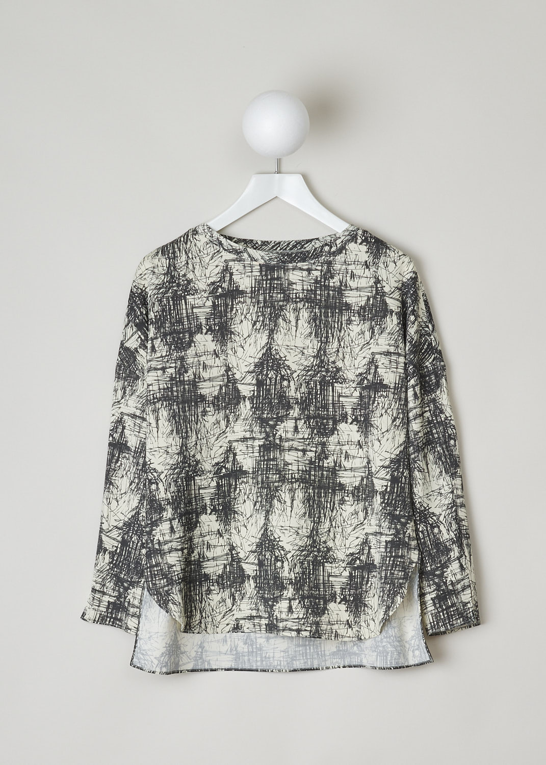 ASPESI, LONG SLEEVE SCRIBBLE PRINT TOP, 5619_V128_60042, Print, Black, White, Front, This top has an off-white base with a black scribble print allover. The top features a round neckline and long sleeves with small slits. In the front, the top has a rounded hemline with side slits. In the back, the hemline is straight. This model has an asymmetric finish, meaning the back is longer than the front.
