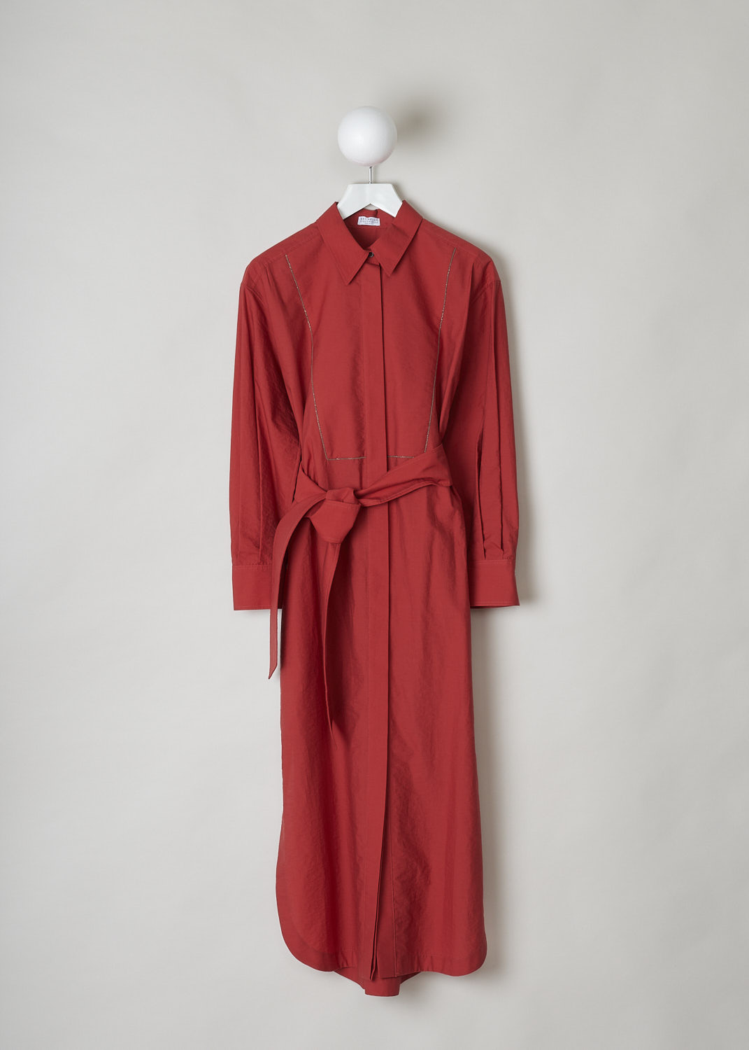 BRUNELLO CUCINELLI, RED SHIRT DRESS WITH MONILI TRIM, M0F79A4933_C2995, Red, Front, This red maxi dress has a classic collar and a concealed front button closure going down the length of the dress. The long sleeves have buttoned cuffs. The front of the dress is subtly decorated with a monili beaded trim. The detachable belt in the same fabric can be used to cinch in the waist. Slanted pockets are concealed in the side seam. In the back, a single box pleat can be found in the centre. 