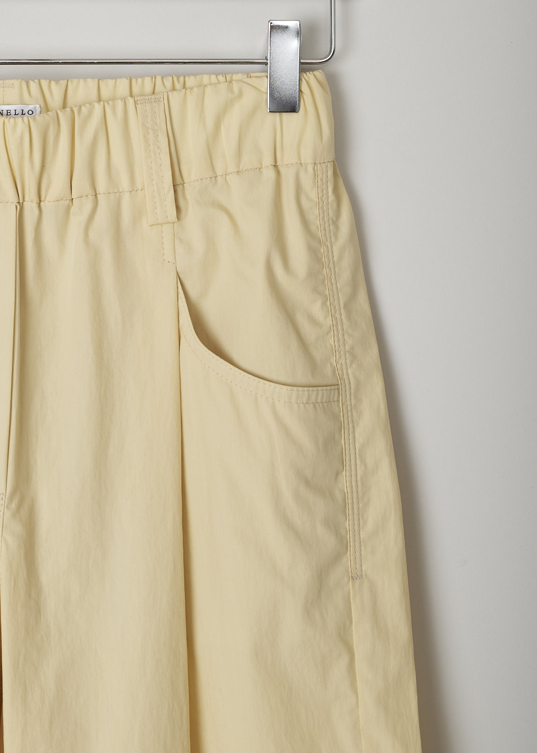 BRUNELLO CUCINELLI, PALE YELLOW SLIP-ON PANTS, M0H93P7894_C8612, Yellow, Detail, These pale yellow high-waisted slip-on pants have an elasticated waistband with belt loops and a mock-fly stitched on the front. These pants have a traditional five pocket configuration, with two pockets and a single coin pocket in the front and two patch pockets in the back. The straight cropped pant legs have front pleats.  
