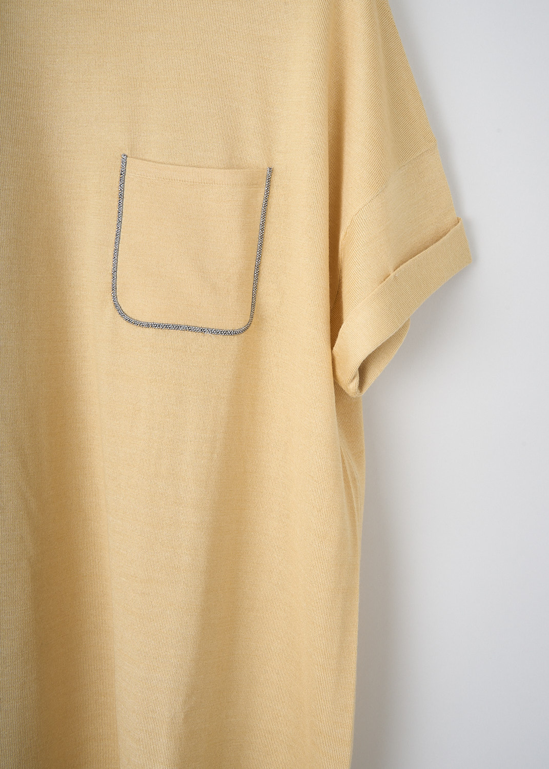 Brunello Cucinelli, Yellow top with monili detailing, M13833600_C2939, Yellow, Detail, This yellow cashmere top has a ribbed round neckline and short rolled sleeves. On the front, this top has a monili trimmed breast pocket. The top has an asymmetrical hemline.
