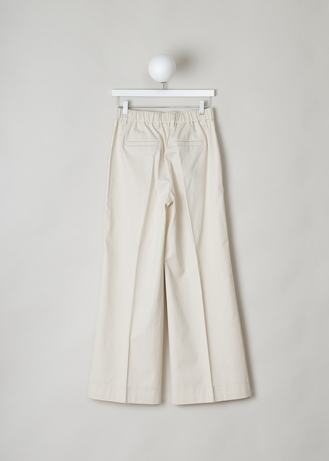BRUNELLO CUCINELLI, BEIGE WIDE-LEG PANTS, MA130P7008_C7365, Beige, White, Back, These beige pants have straight wider pant legs with a folded hem. The pant legs have pressed centre creases. The waistline has belt loops and is elasticated in the back. The closure option is a concealed hook and zipper. The pants have forward slanted pockets in the front and welt pockets in the back. 


