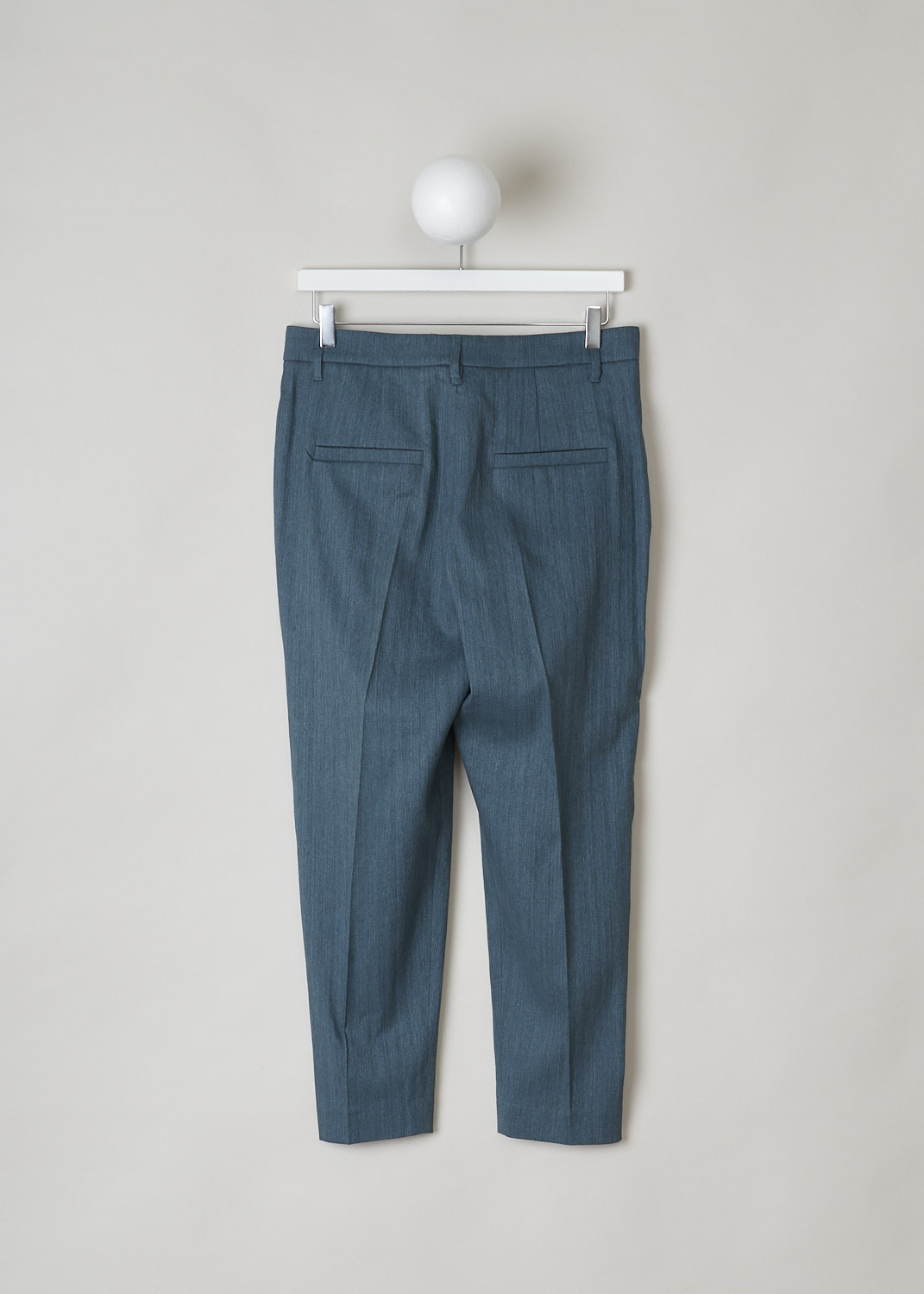 BRUNELLO CUCINELLI, TEAL GREEN LINEN BLEND PANTS, MF578P6985_C175, Green, Blue, Back, These teal green pants have a flat front model with tapered legs. These pants have a concealed clasp and zip closure. The fabric is a cotton linen blend. The model has four pockets, two slanted slip pockets on the front and two welt pockets on the back. On of the belt loops is subtly decorated with monili beads.
