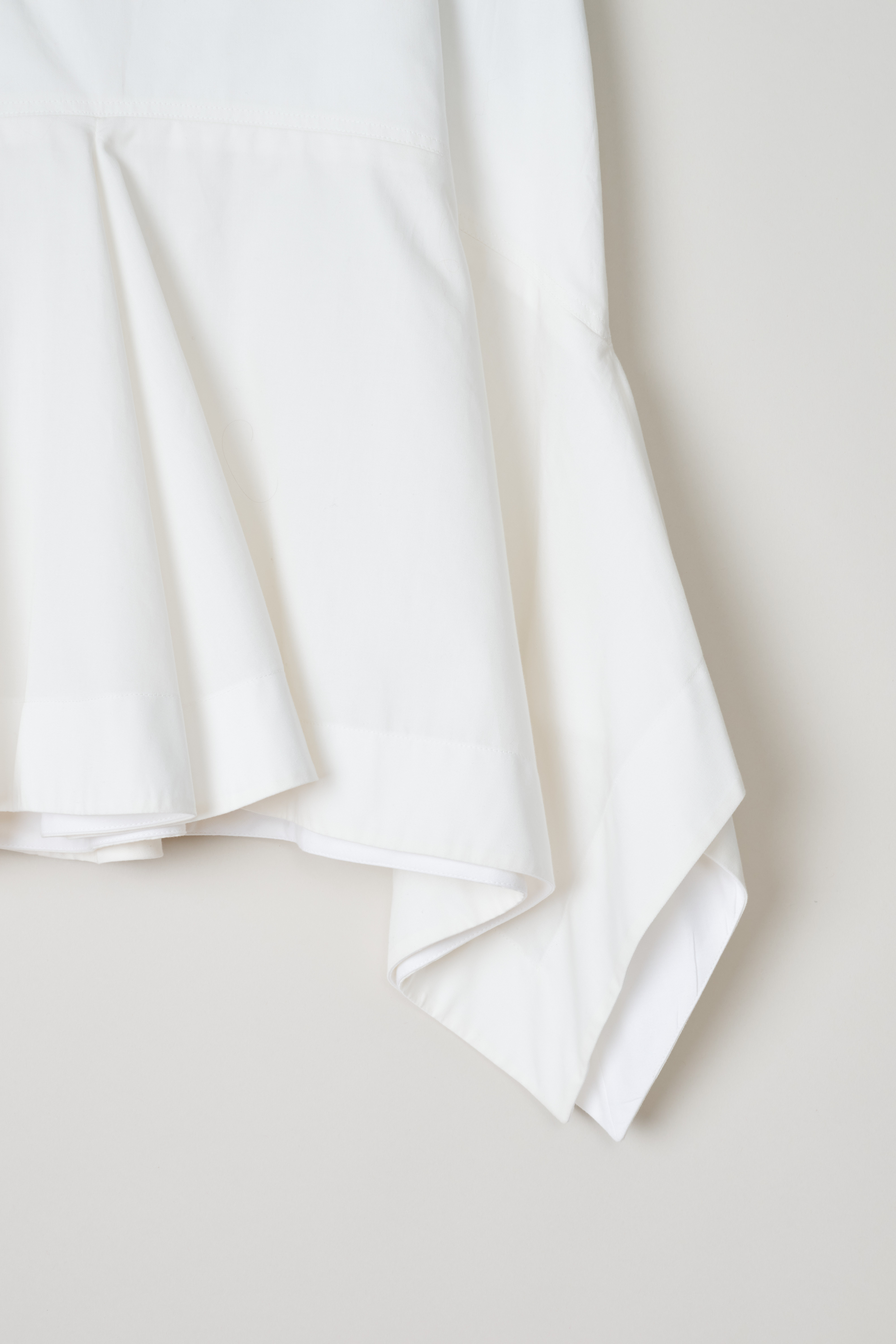 Calvin Klein 205W39NYC, White bell skirt, 91WWSC02_C173_101_white, white, detail, Midi skirt made of pure white cotton. Featuring a bell shaped model with a ruffled hemline. There is a concealed zipper on the side seam. 