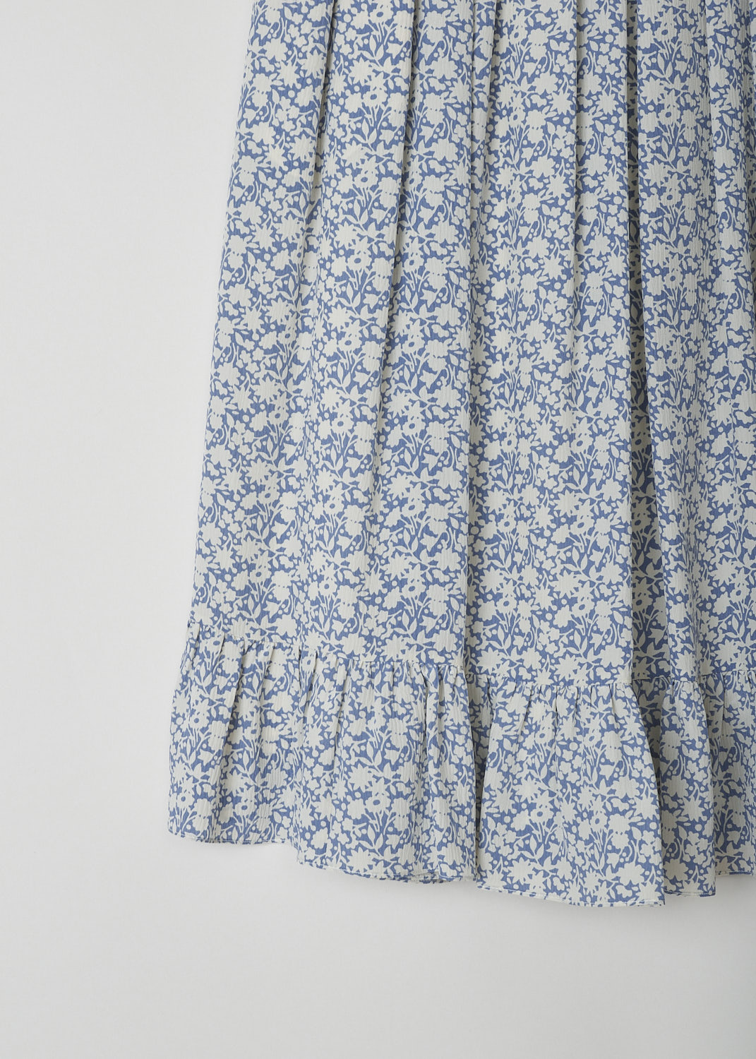 CELINE, BLUE AND WHITE FLORAL MIDI SKIRT, 757L_2J264_07BW, Blue, White, Print, Detail, This blue and white floral pleated skirt has a concealed side zip, concealed slanted pockets and a flounce hemline. The skirt is midi length and is fully lined. 
