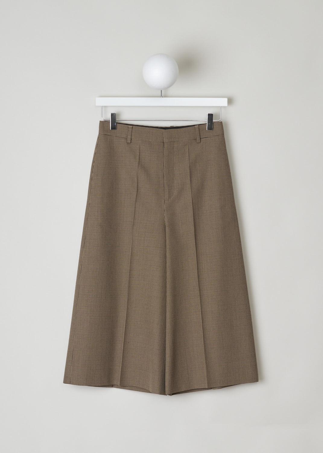 CELINE, BROWN HOUNDSTOOTH CULOTTES, 868H_2P233_28BZ, Brown, Print, Front, Brown Houndstooth culottes made from wool. These pants have belt loops and the closing option on this model is a concealed hook, button and zipper option. In the front, along the length of the pants, a front pleat can be found. These pants have slanted pockets in the front and two welt pockets in the back.
