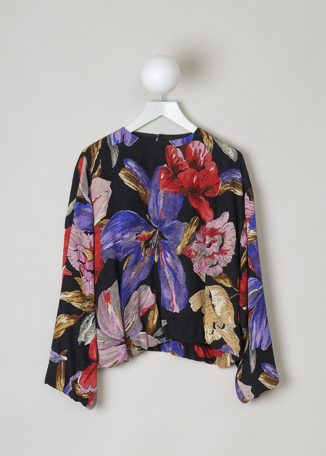 DRIES VAN NOTEN, TOP WITH MULTICOLOR FLORAL PRINT, CAPO_6159_WW_SHIRT_BLACK, Black, Purple, Print, Front, This top has a black base color with a multicolored floral print. The top has a high, round neckline with a keyhole button closure in the back. The long sleeves have elasticated cuffs. The top has a cropped length with an elasticated hemline. 

