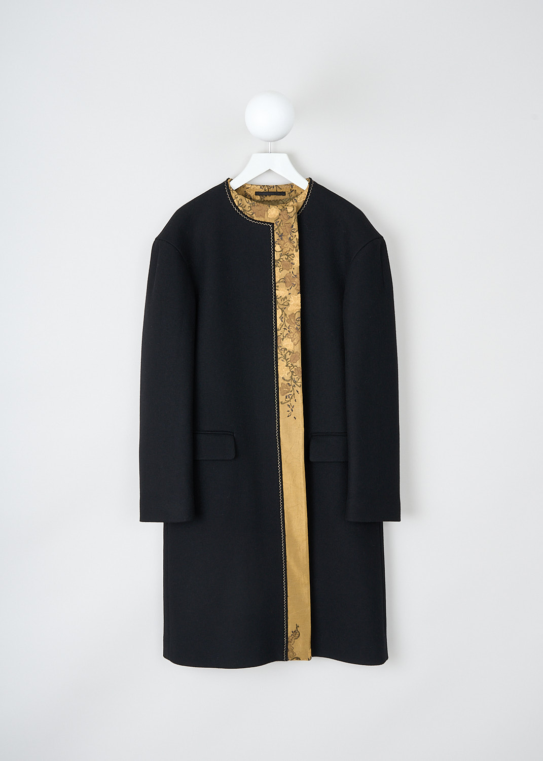 Dries van Noten, Open-front coat with floral gold trim, RIVKA_7228_WW_COAT_900_BLACK, Black, Gold, Front, This black open-front coat has a round neckline and an open front with a floral gold placket trim. A gold-tone zigzag seam can be found along the gold floral trim. The long sleeves have straight cuffs. The coat has a single inner pocket and two flap welt pockets. In the back, the coat has a centre vent. 