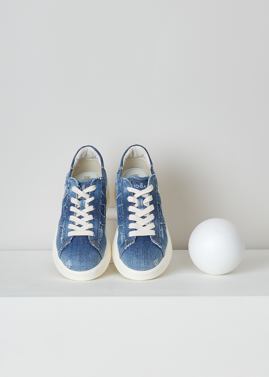 HOGAN, REBEL H562 ALL JEANS SNEAKER, GYW5620EY80JDLU803_H562, Blue, Top, These Rebel H562 All Jeans sneakers are made in a distressed denim fabric. These sneakers have a front lace-up fastening with white laces. These sneakers have a round nose and a broad white rubber sole. On the sides, the brand's H logo is incorporated in the design. The sneakers come with an additional pair of laces in blue. 
