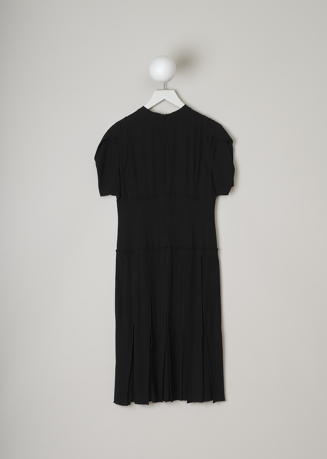 MARNI, BLACK DECONSTRUCTED DRESS, ABMA0096FY_TV285_00N99, Black, Back, This black deconstructed dress has a round neckline and short puff sleeves. The dress has a paneled bodice with exposed seams and raw edges and a box pleated skirt. A concealed centre zip in the back functions as the closure option.   
