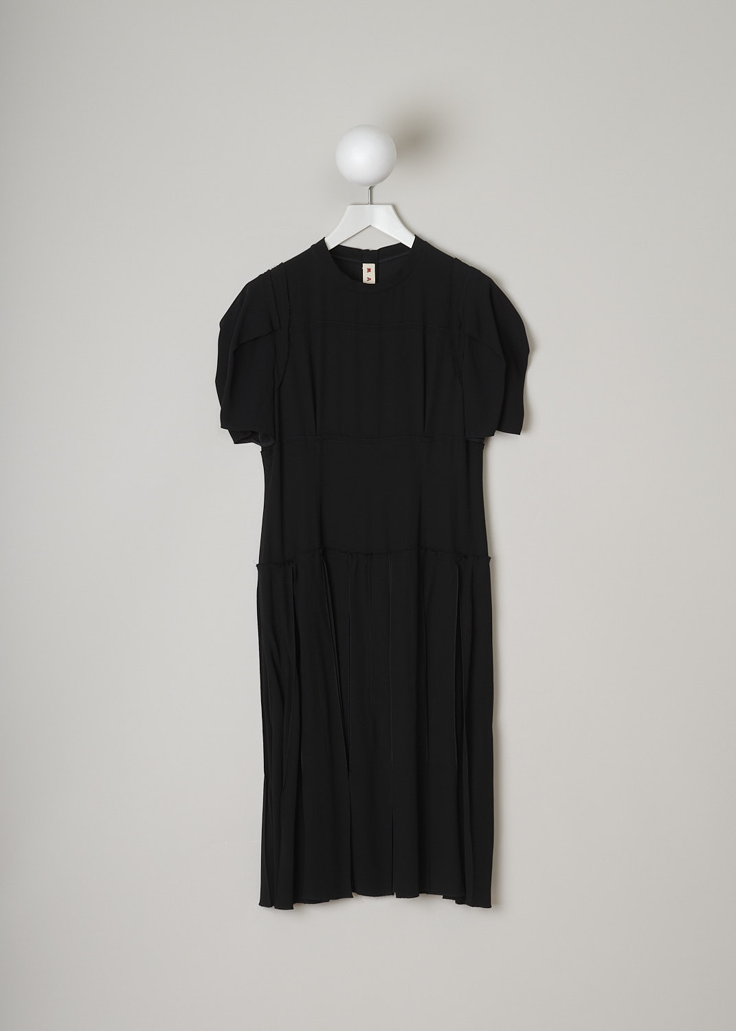 MARNI, BLACK DECONSTRUCTED DRESS, ABMA0096FY_TV285_00N99, Black, Front, This black deconstructed dress has a round neckline and short puff sleeves. The dress has a paneled bodice with exposed seams and raw edges and a box pleated skirt. A concealed centre zip in the back functions as the closure option.   
