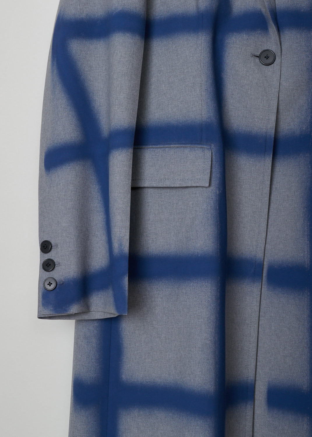 Marni, Checkered overcoat in grey and blue, CPMA0145U6_USCR90_SCB65, blue grey, detail1, Knee-long overcoat featuring a blue checkered design on a grey background. The collar that leads into the notched lapel, going further down you will find a single buttoned fastening option. Comes long sleeves supporting three buttons. Furthermore the back of this model is left monotone to emphasize the front. Two flap pockets can be found on the front. 