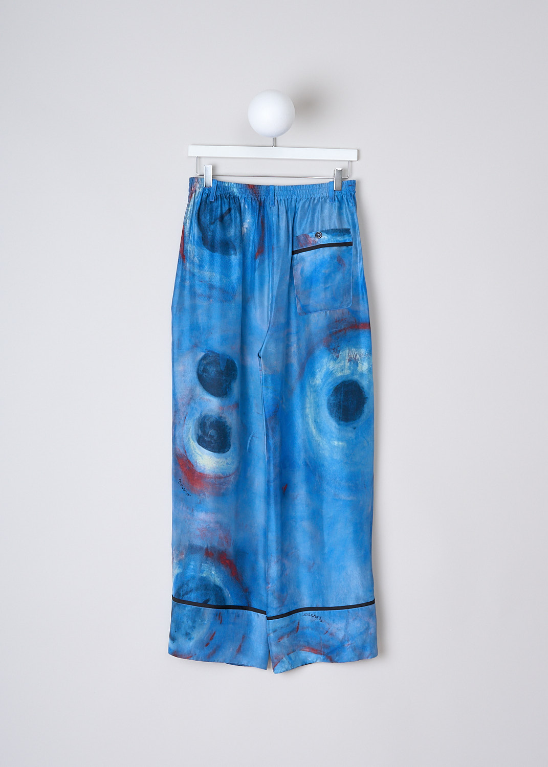 MARNI, COBALT BLUE SILK PANTS, PAMA0335I0_UTSF97_BBB44, Blue, Red, Print, Back, These high-waisted silk 'Buchi Blu' pants have an abstract print with painterly red and blue splotches throughout. These pants have a partly elasticated waistband with belt loop and a front button and zip closure. In the front, the pants have forward slanted pockets. The wide pant legs have a broad hem. In the back, these pants have a single buttoned patch pocket.
  
