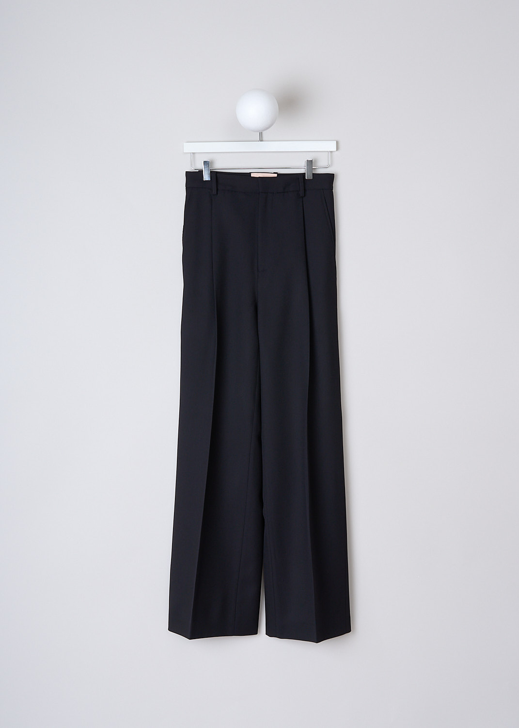 PLAN C, NAVY BLACK WOOL DRILL PANTS, PNCAA55L08_TW039_00B98, Black, Blue, Front, These navy black drill wool pants  have a waistband with belt loops and a button and zip closure. The pants are high-waisted with wide pant legs. Pressed centre creases run along the length of the pant legs. These pants have slanted pockets in the front. In the back, the pants have one flap welt pocket and one buttoned welt pocket. 
