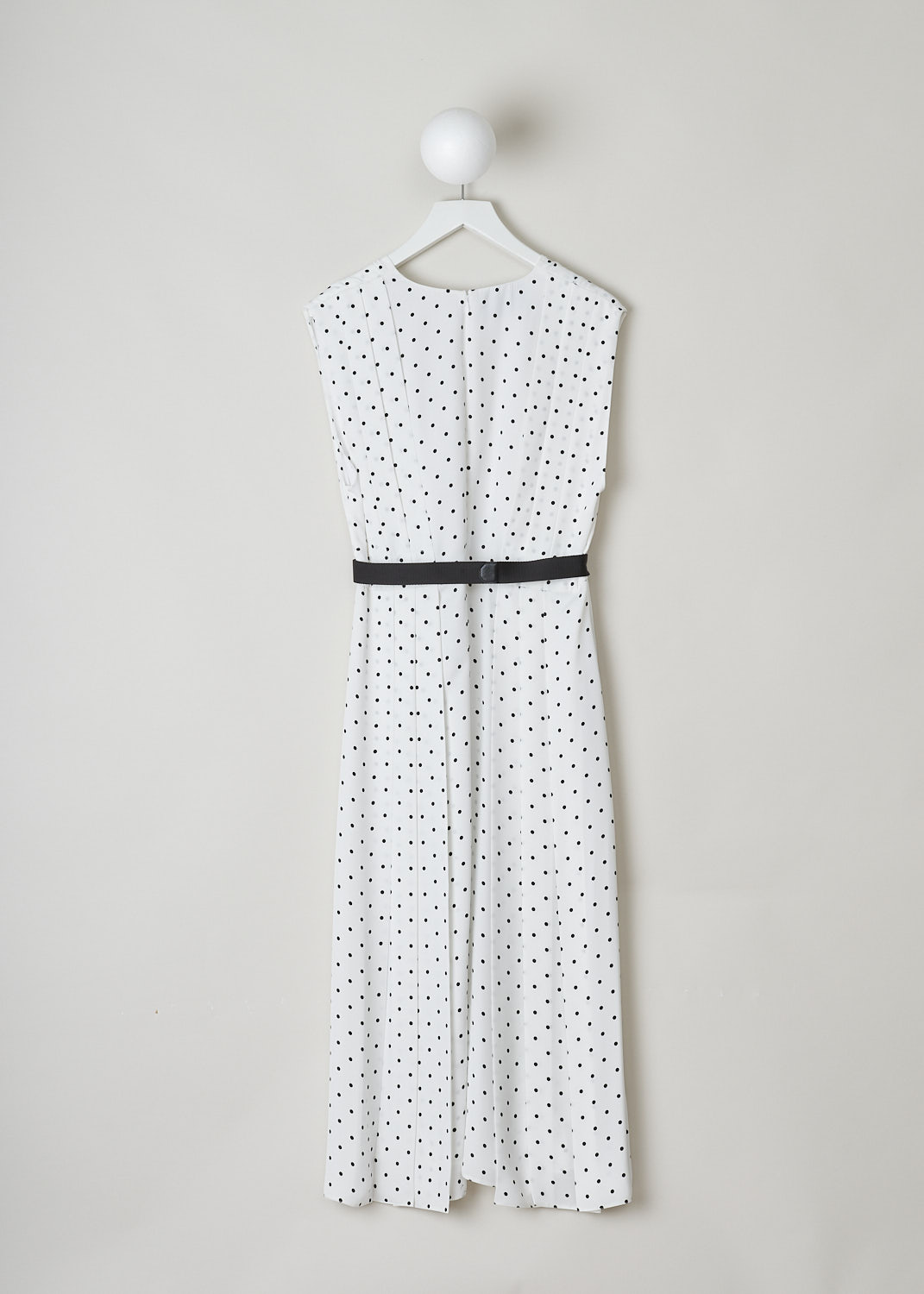 PRADA, WHITE POLKA-DOT MIDI DRESS WITH BELT, TWILL_FLUIDO_PO_P3D12H_F0A72_AVORIO_NERO, Black, White, Print, Back, This sleeveless silk dress has a white base with a black polka-dot print. The bodice has a V-neckline and pleats that go down into the skirt. A black canvas belt with a silver buckle can be used to cinch in the waist. A concealed centre zip in the back functions as the closure option. The dress comes with a detachable slip dress. 
