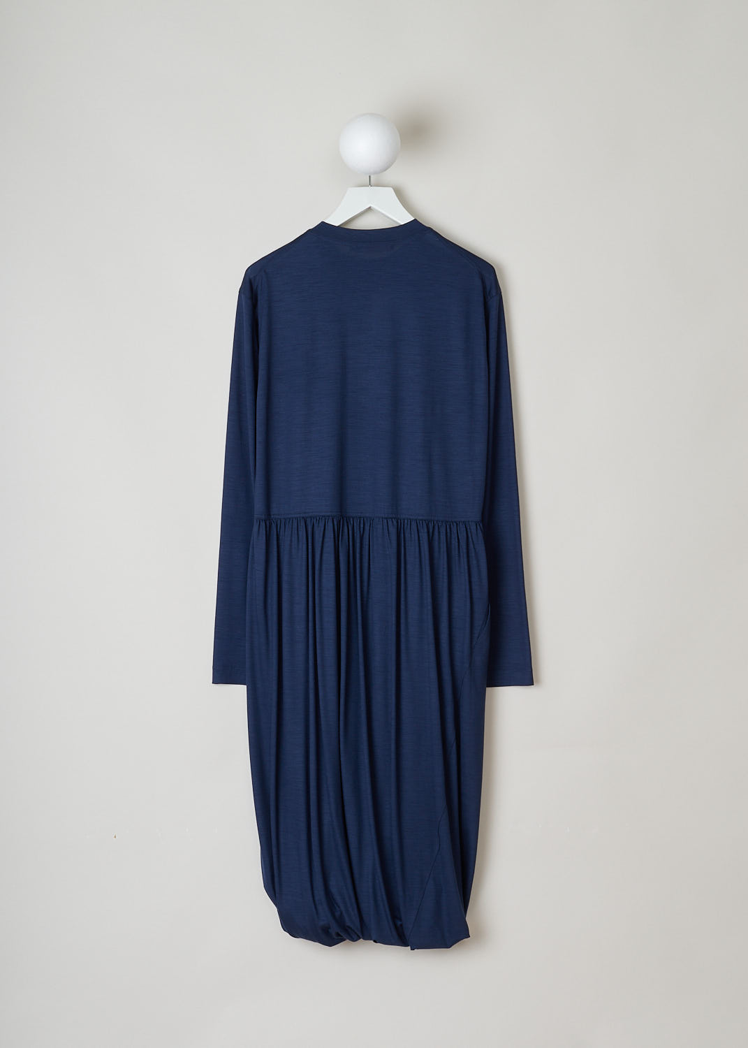 SOFIE Dâ€™HOORE, NAVY BLUE LONG SLEEVE DRESS, DEMURE_WOJE_NAVY, Blue, Back, This navy blue mid-length dress features a round neckline, a plain long sleeve bodice and a twisted balloon skirt. A single side pocket can be found concealed in the seam. 

