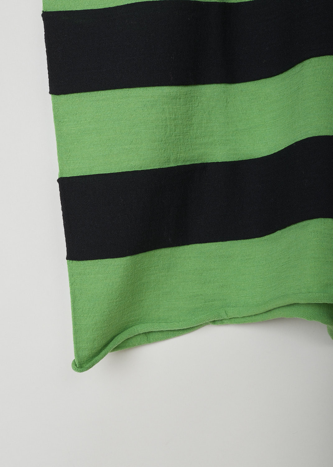 SOFIE Dâ€™HOORE, GREEN AND BLACK STRIPED VEST, MODA_YFIMBI_GREEN_BLACK, Green, Black, Detail 1, This green and black striped wool vest has a ribbed V-neckline. That same ribbed finish can be found around the armholes. The vest has a rolled hemline. The vest has a wider silhouette. 
