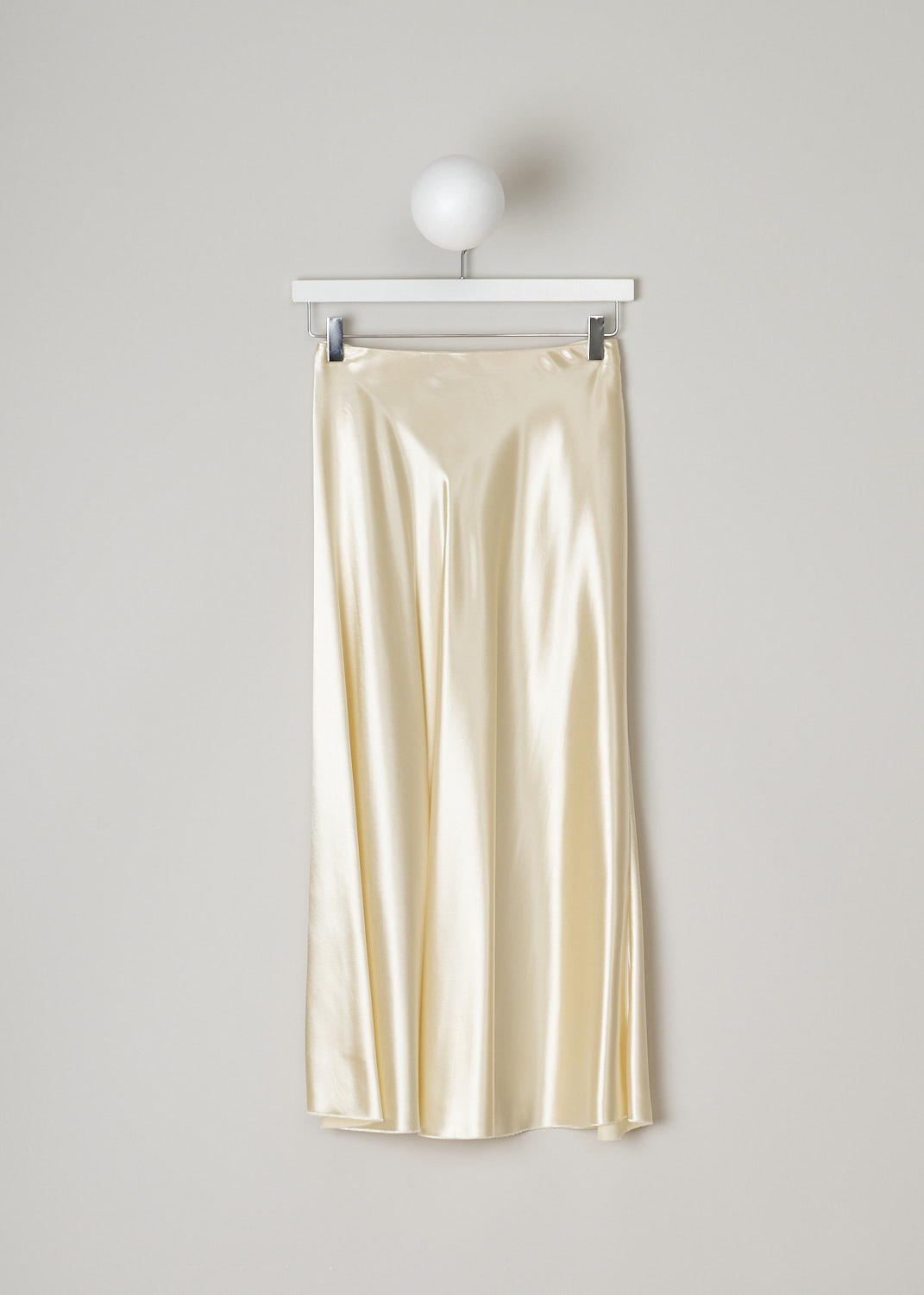 THE ROW, SATIN MEDELA SKIRT IN VANILLA, MEDELA_SKIRT_I068WI_723_VANILLA, Beige, White, Back, This flared vanilla yellow satin skirt has an elasticated waistband and a concealed side zip that functions as the closure option. The skirt has an asymmetrical hemline with a raw finish. 

