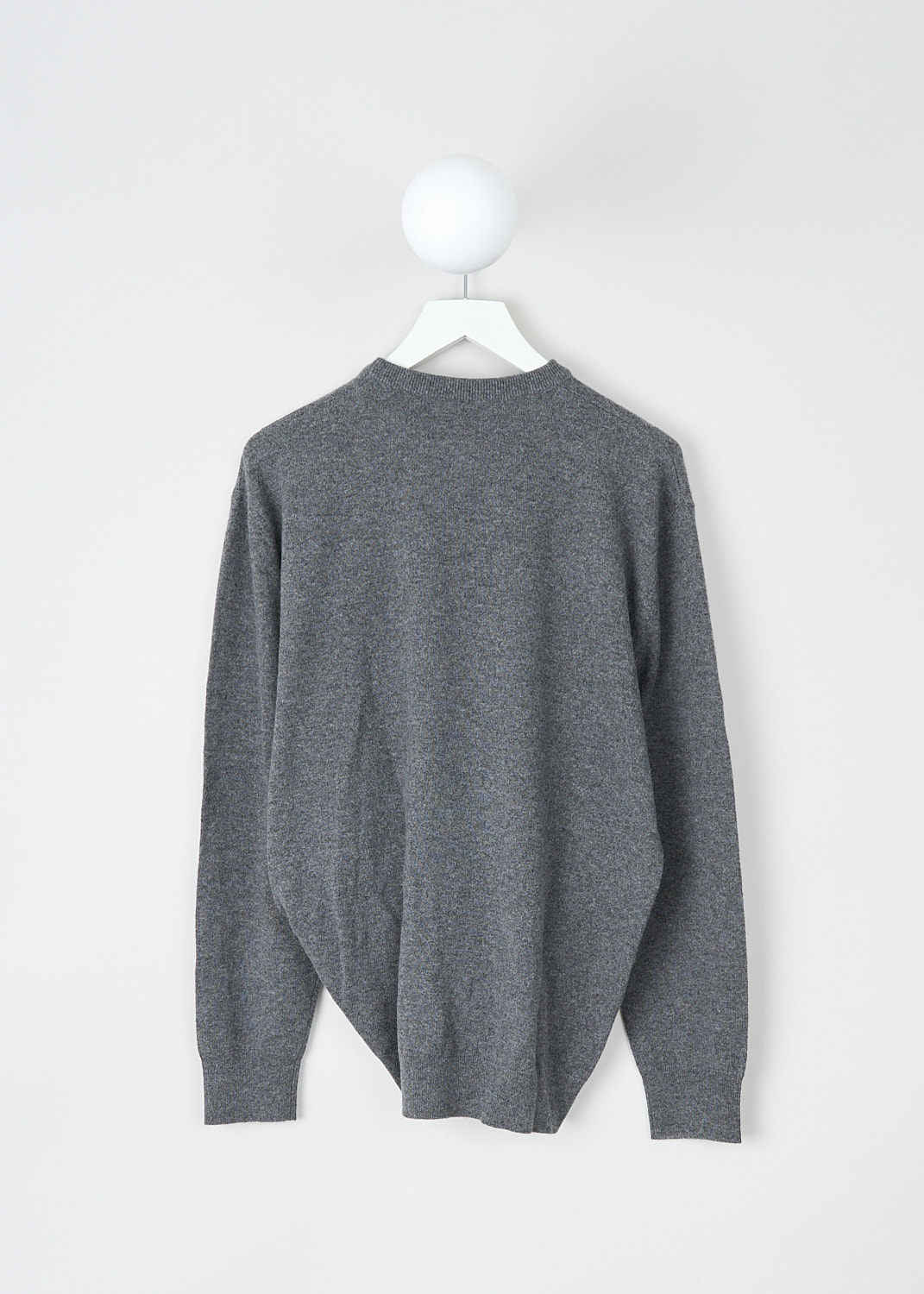 The Row, Grey cashmere Melino sweater, MELINO_TOP_6810_F377, Grey, Back, The grey Melino sweater has a ribbed crewneck. The long sleeves have ribbed cuffs. The hemline has the same ribbed finish. In the front, the sweater has a knotted detail. 
