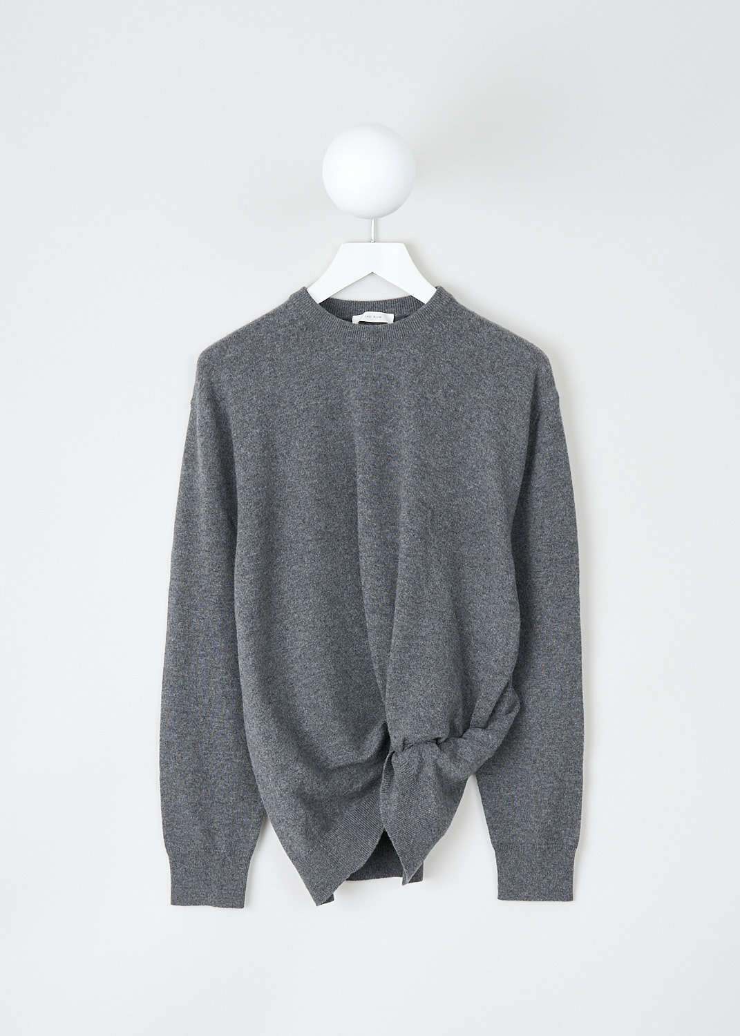 The Row, Grey cashmere Melino sweater, MELINO_TOP_6810_F377, Grey, Front, The grey Melino sweater has a ribbed crewneck. The long sleeves have ribbed cuffs. The hemline has the same ribbed finish. In the front, the sweater has a knotted detail. 
