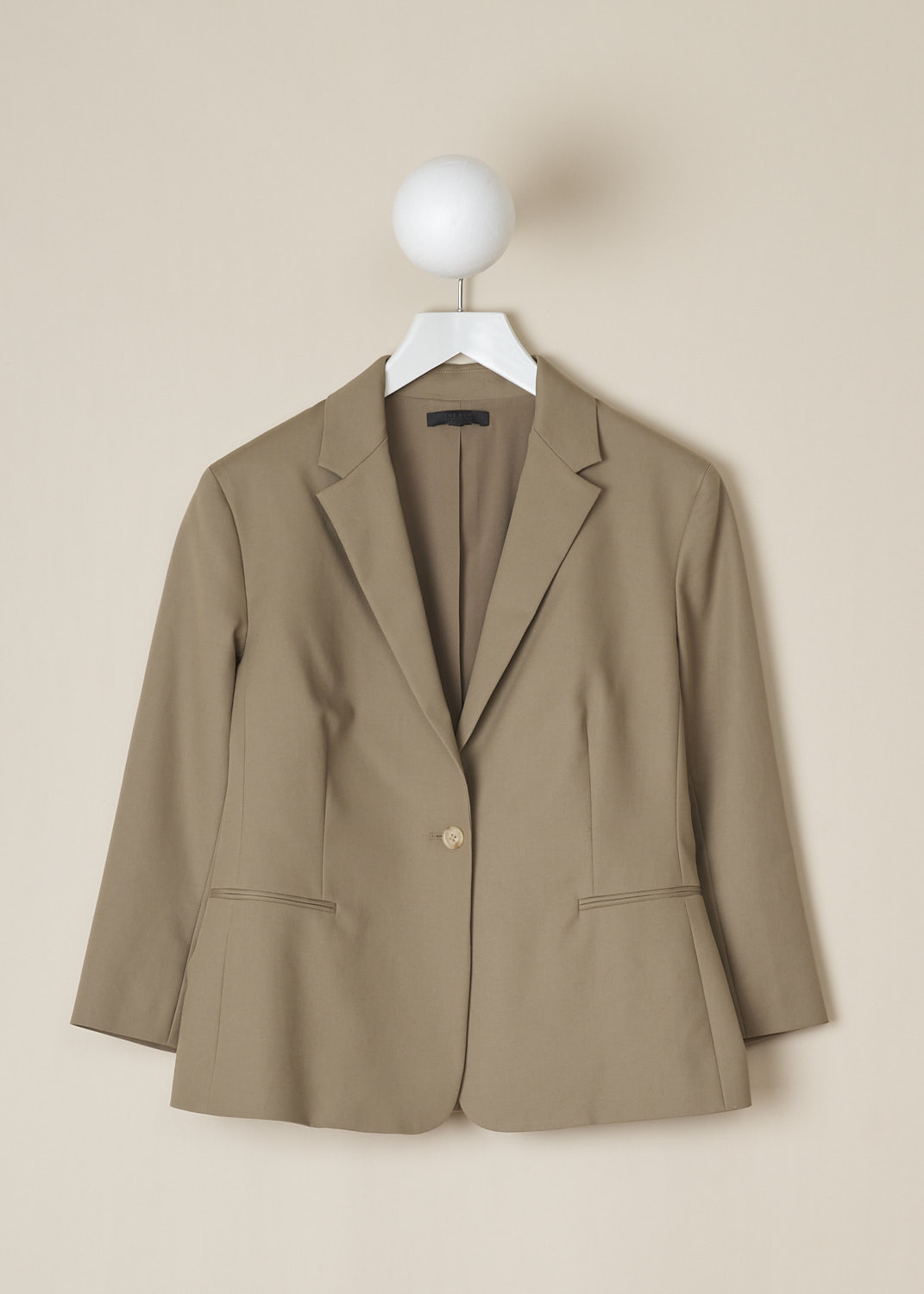 THE ROW, REMY JACKET IN SEPIA, REMY_JACKET_1113W580_SEPIA, Beige, Brown, Front, This cropped Sepia colored jacket has a notched lapel and a front button closure. The jacket has three-quarter sleeves. In the front, the jacket has welt pockets. 


