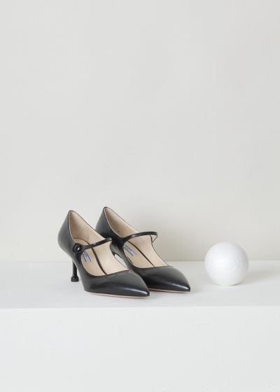Prada, Stiletto heeled black mary jane,  spazzolato_1I491L_F0002_nero, black, front, Mary jane pump with a stilleto heel, featuring pointed toes, a button that holds the strap in place which in addition acts as your fastening option. 

Heel height: 6.5 cm / 2.5 inch.