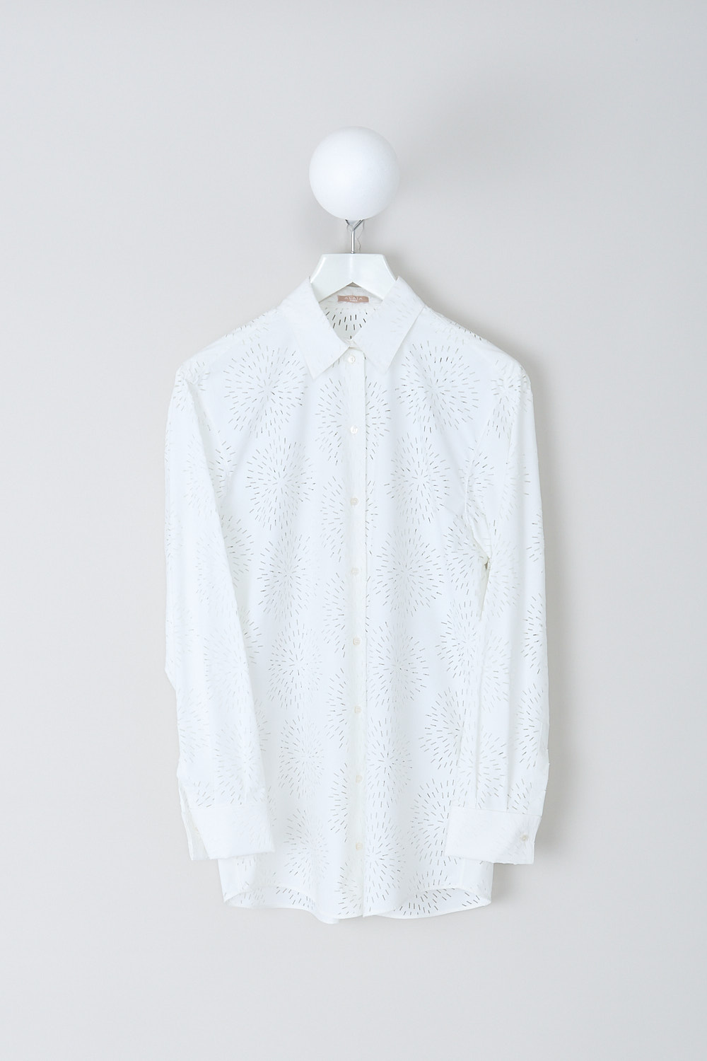 ALAÏA, WHITE OPENWORK FEU D'ARTIFICES BLOUSE, AA9C0751RTL12_BLANC, White, Front, This white cotton-blend blouse has a classic collar and a front button closure. The long sleeves have buttoned cuffs. The blouse has a openwork pattern throughout. The blouse has a slightly rounded hemline. 
