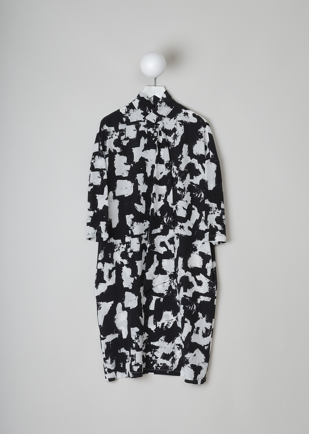 ASPESI, BLACK AND WHITE MIDI DRESS, 2992_V126_62241, Black, White, Print, Front, This black and white printed midi dress has a high-neck with an incorporated tie detail. The dress has dropped shoulders with three-quarter sleeves. Concealed slanted pockets can be found on-seam. The dress has a straight hemline.
