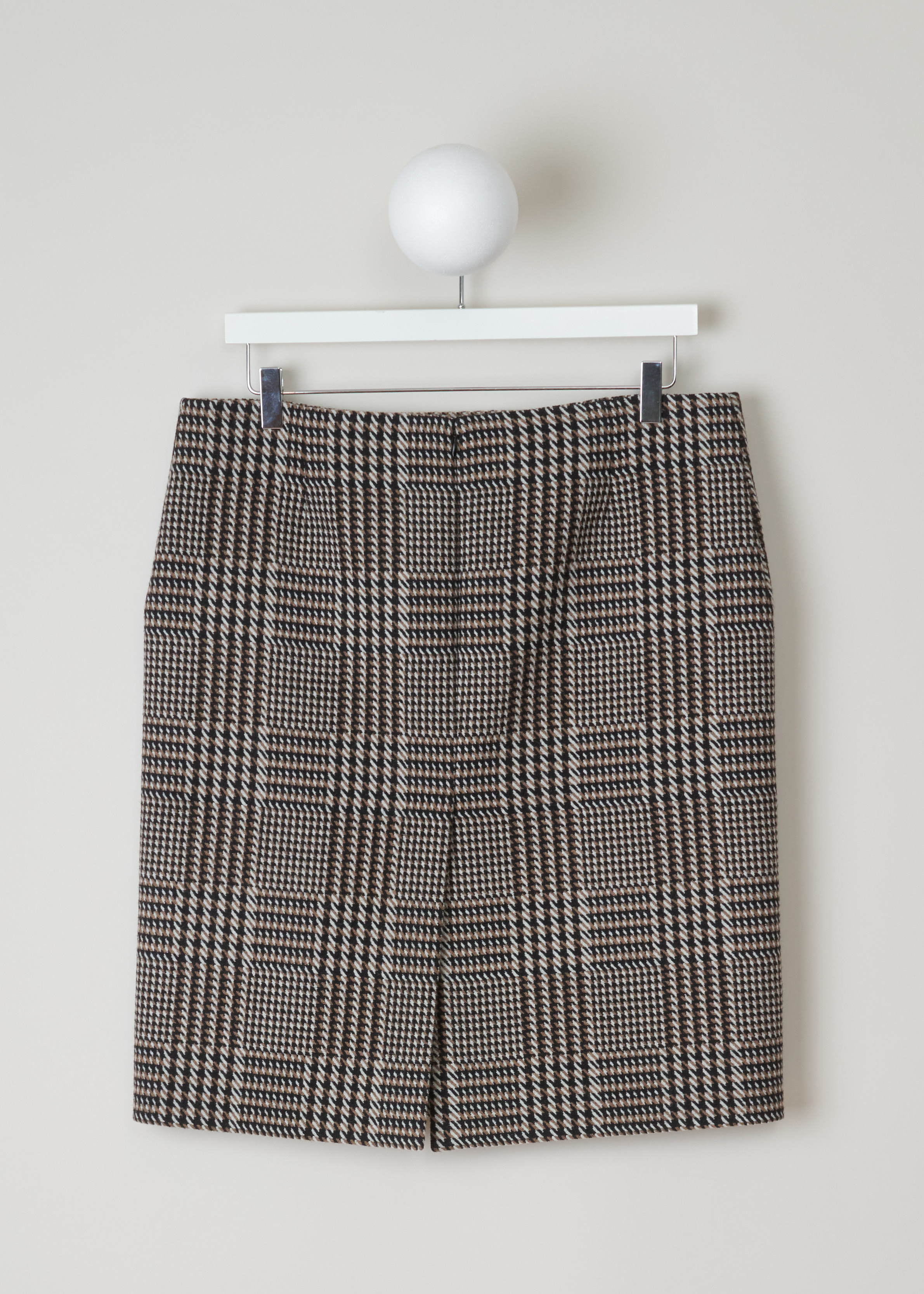 Balenciaga Tweed pencil skirt 528505_TBU21_2684 brown black back. Pencil skirt in brown, black and white tweed with a tailored fit, Balenciaga logo printed on the front, centre back split and an invisible zipper fastening at the back.