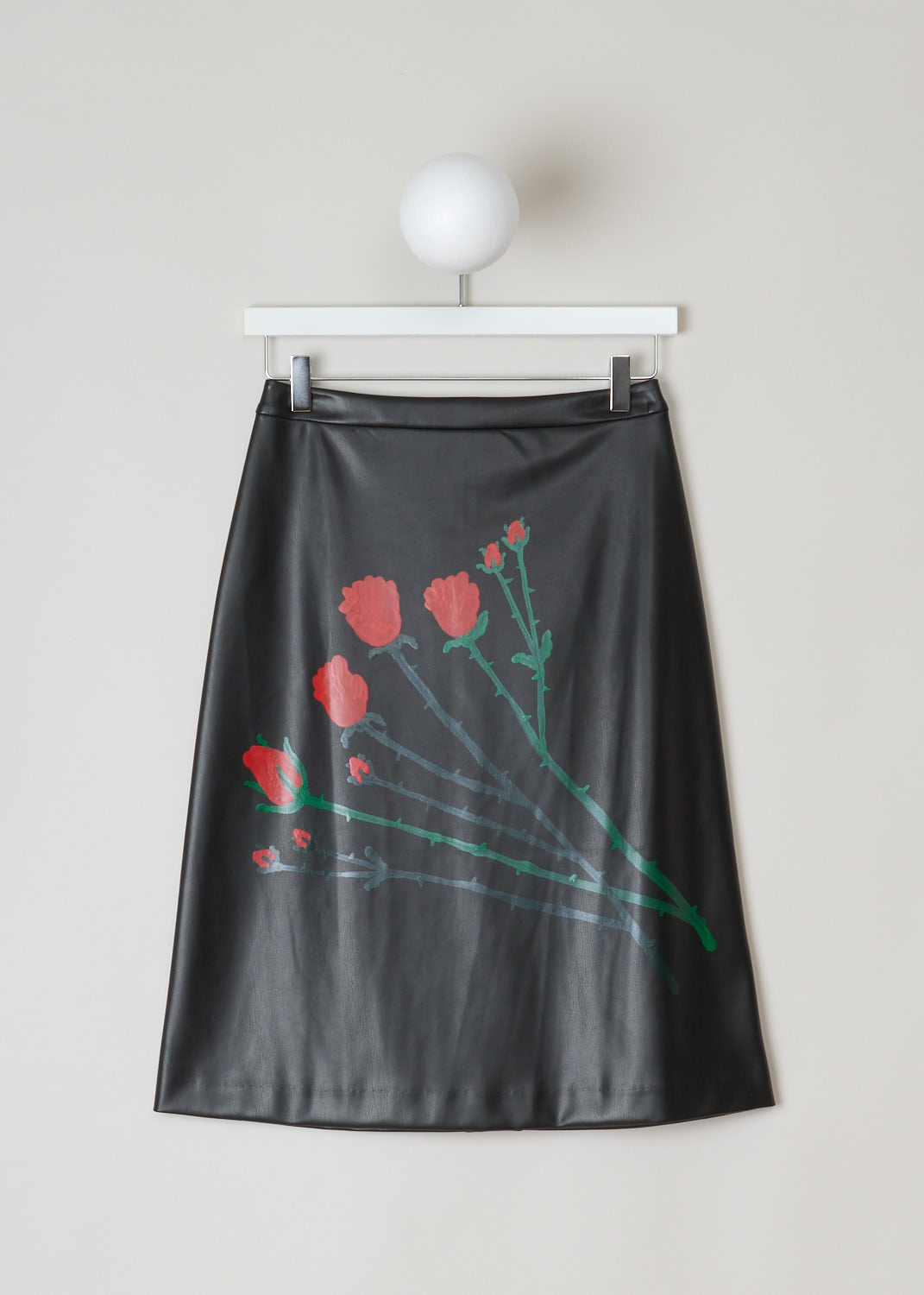 Bernadette, Black vegan leather a-line skirt, skirt_eva_vegan_leather_handpainted_red_rose_bouquet, black red green, front, You will not only look good but also do good, in this vegan leather skirt. Made into an a-line model with a concealed zip fastening option on the back. The red roses on the skirt are entirely hand painted which adds to the exclusivity. 