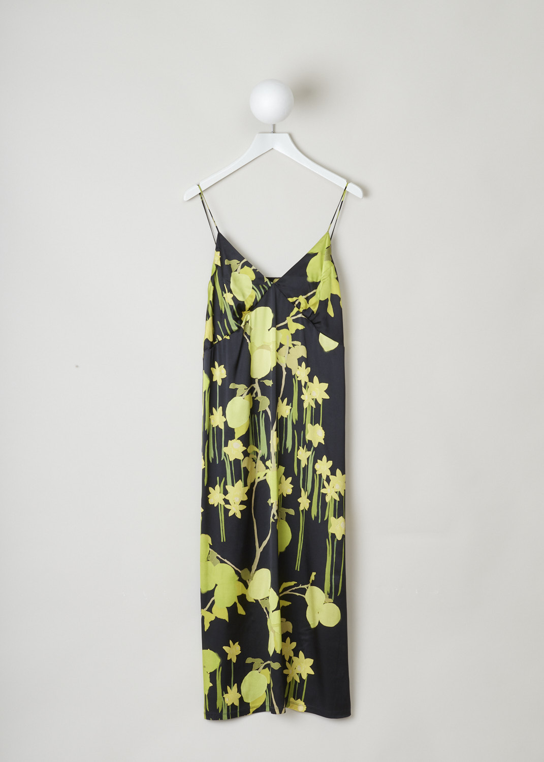 BERNADETTE, BLACK SILK SLIP DRESS WITH VIBRANT PRINT, HS22_RTW_SLDRESS_JEA_SSS_2, Black, Print, Front, Silky smooth black satin midi dress with lime green print. The dress has a V-shaped neckline with barely-there straps. It's decorated with vibrant lemons and daffodils. 