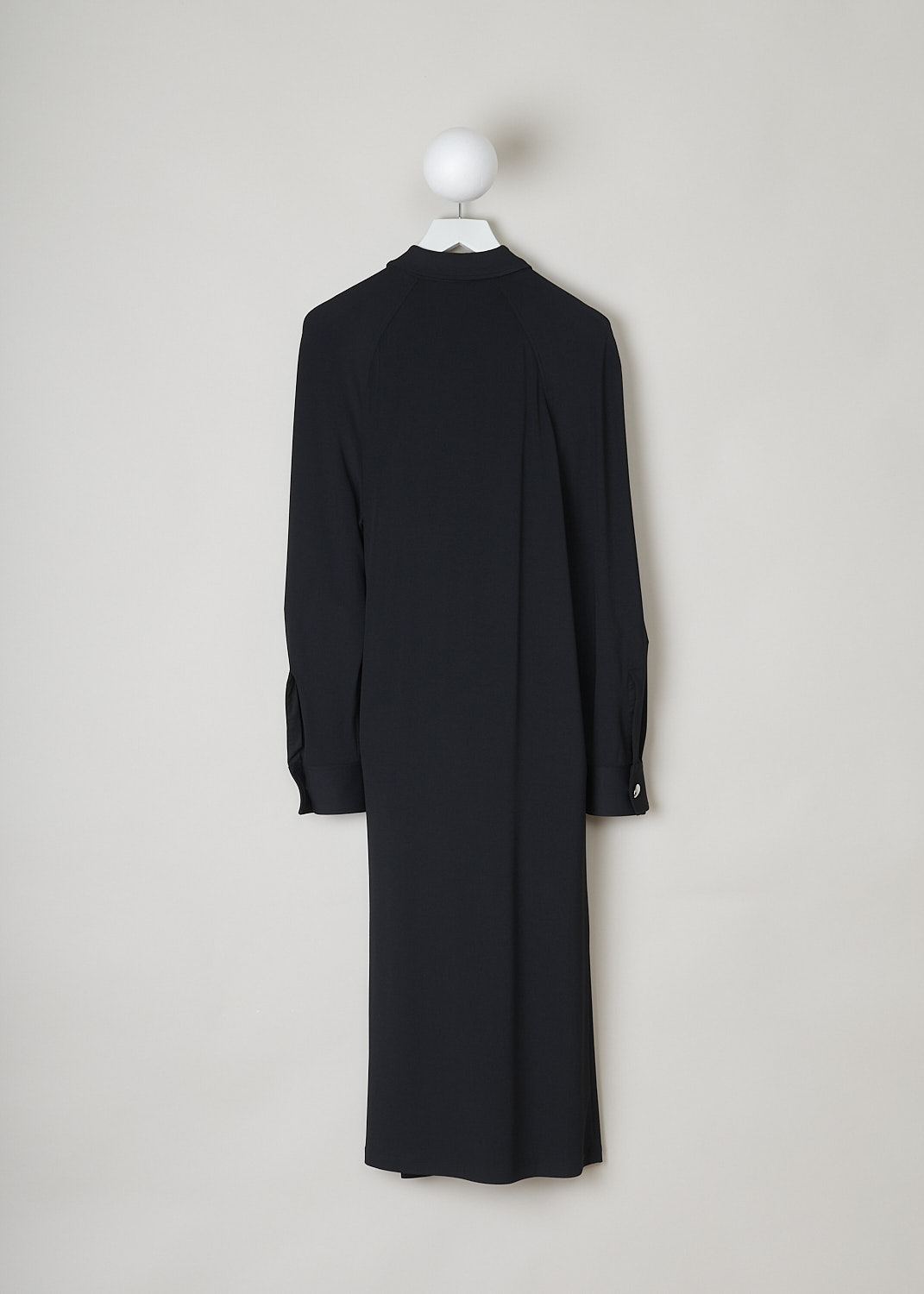 Bottega Veneta, Black blouse dress, 609304_VKIJ0_1000_crÃªpe_jersey, black, back, Black dress with maxi length and a crÃªpe de chine fabric. Featuring a blouse dress model, a pointed collar that leads onto the long cuffed sleeves with a single button. Horseshoe shaped embellishment decorates the front and causes draping pleats which suit this model brilliantly. Furthermore this model comes with a front fastening option being buttons. 