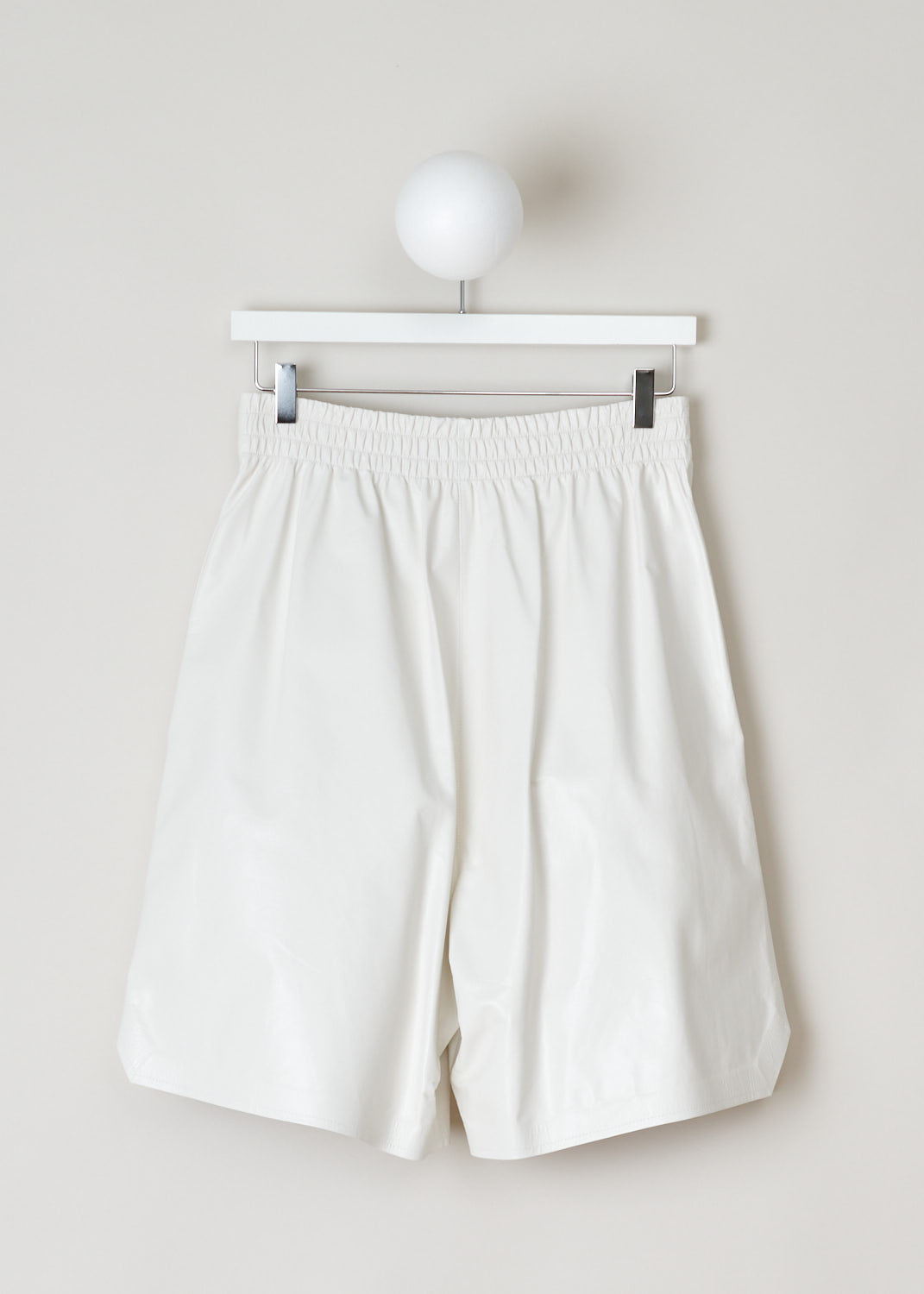 Bottega Veneta, White patent leather shorts, 633445_VKLC0_9068, white, back, these shorts made from white shiny leather. Featuring an oversized fit with the slip-in pockets being on the side seam, the elastic waistband acts as you fastening method on this model. 