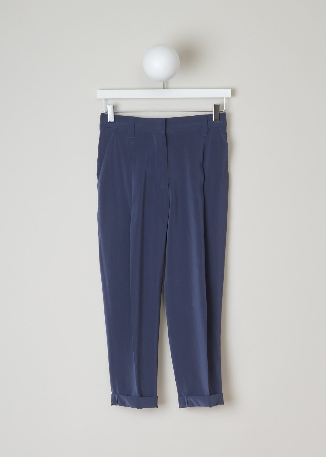 Brunello Cucinelli, Blue silk pants, M0F51P1362_C2435, blue, front, Blue pants with a slight shine to it. Featuring a single pleat and forward slanted pockets. As your closure option this model has a zipper with a metal hook and a backing button. The cropped length with the rolled up hems just adds style to these pants. On the backside you will find two welt pockets.