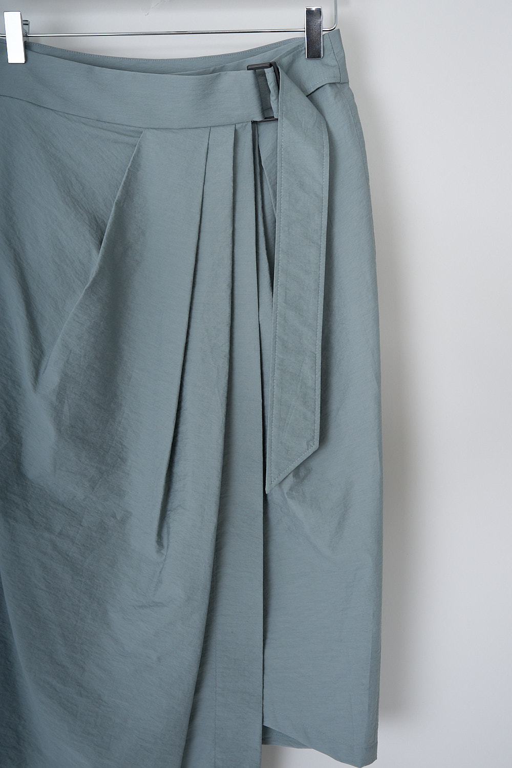 BRUNELLO CUCINELLI, PALE SAGE GREEN MIDI WRAP SKIRT, M0F79G2896_C7542, Green, Grey, Detail, This pale sage green midi wrap skirt has a broad waistband with a build-in belt. Together with the belt, an inner button functions as the closure. The skirt has a pleated front and is fully lined.  
