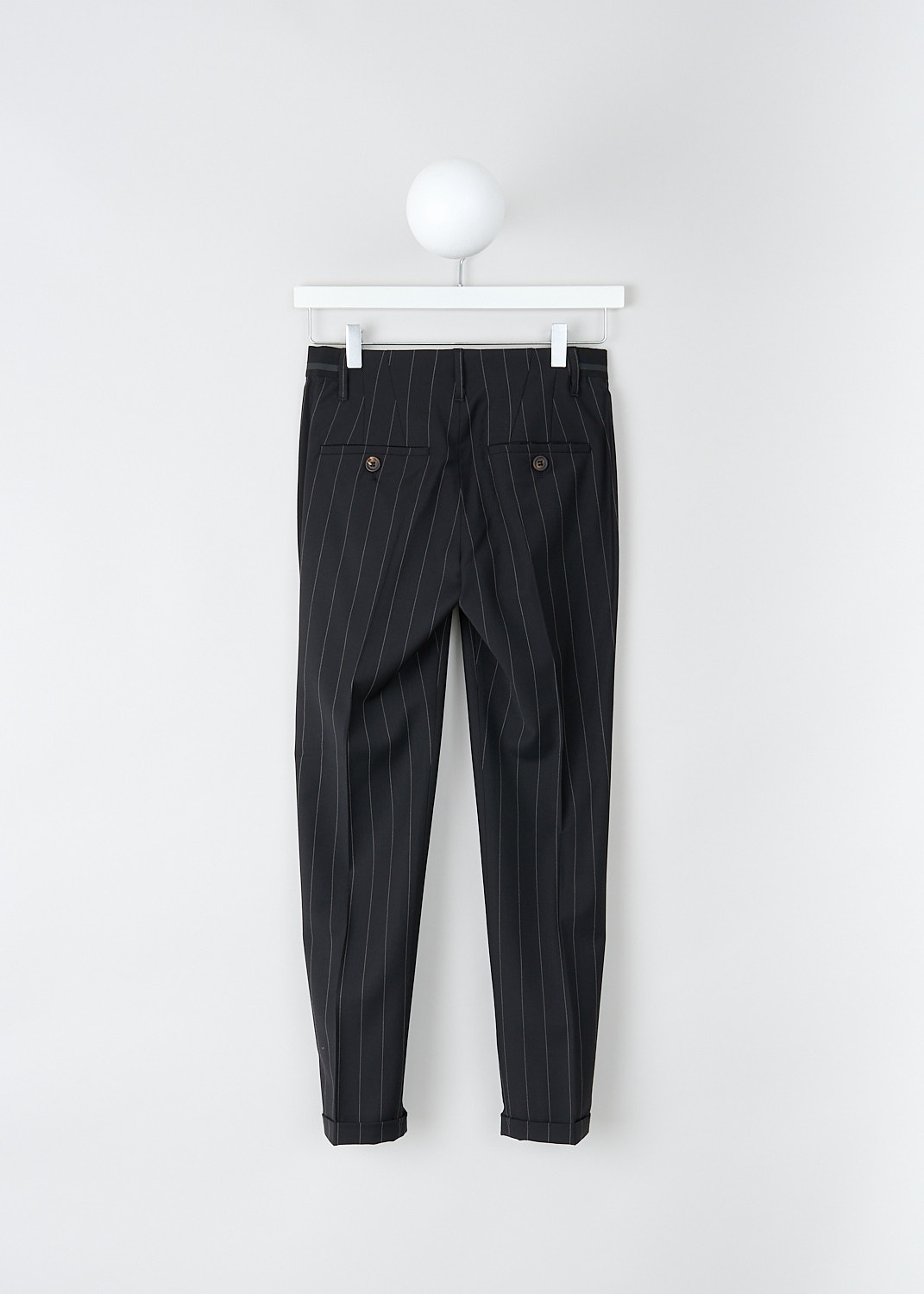 BRUNELLO CUCINELLI, BLACK TROUSERS WITH PINSTRIPE, M0H35P1500_C180, Black, Back, These black pinstripe pants are made of a wool blend. Featuring a partly elasticated waistline, forward slanted pockets in the front, and two buttoned welt pockets in the back. Along the length of the pant leg, centre creases can be found. These pants have a folded hem.