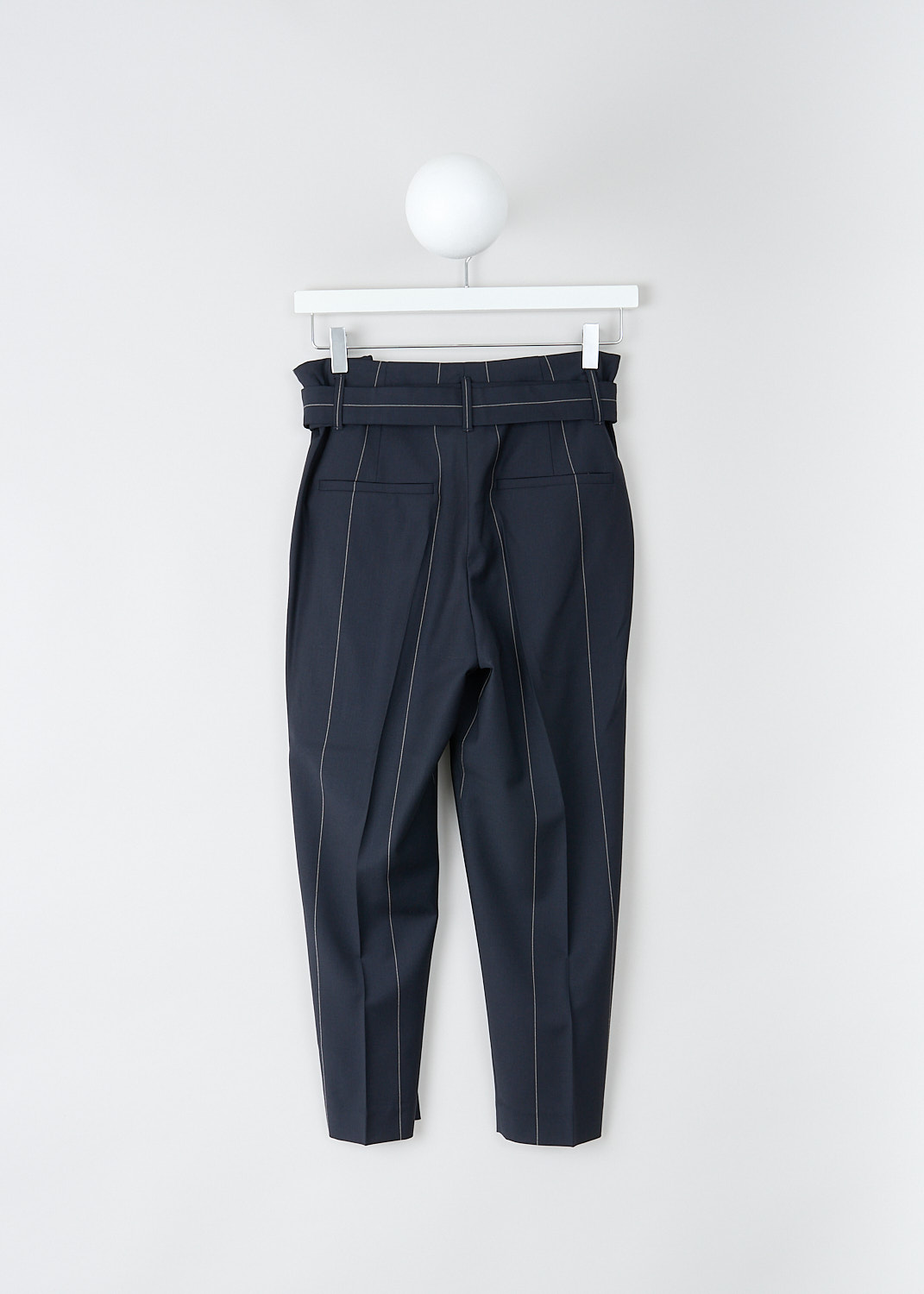 Brunello Cucinelli, Navy blue pants with white pinstripe, M0H36P6249_C6009, Blue, Print, Back, These navy blue pinstripe pants have a broad waistline with belt loops. These pants include a D-ring belt made in the same fabric. A concealed clasp and zipper functions as the closure option. The slightly tapered pant legs have centre creases. Slanted pockets can be found in the front and welt pockets in the back. 
