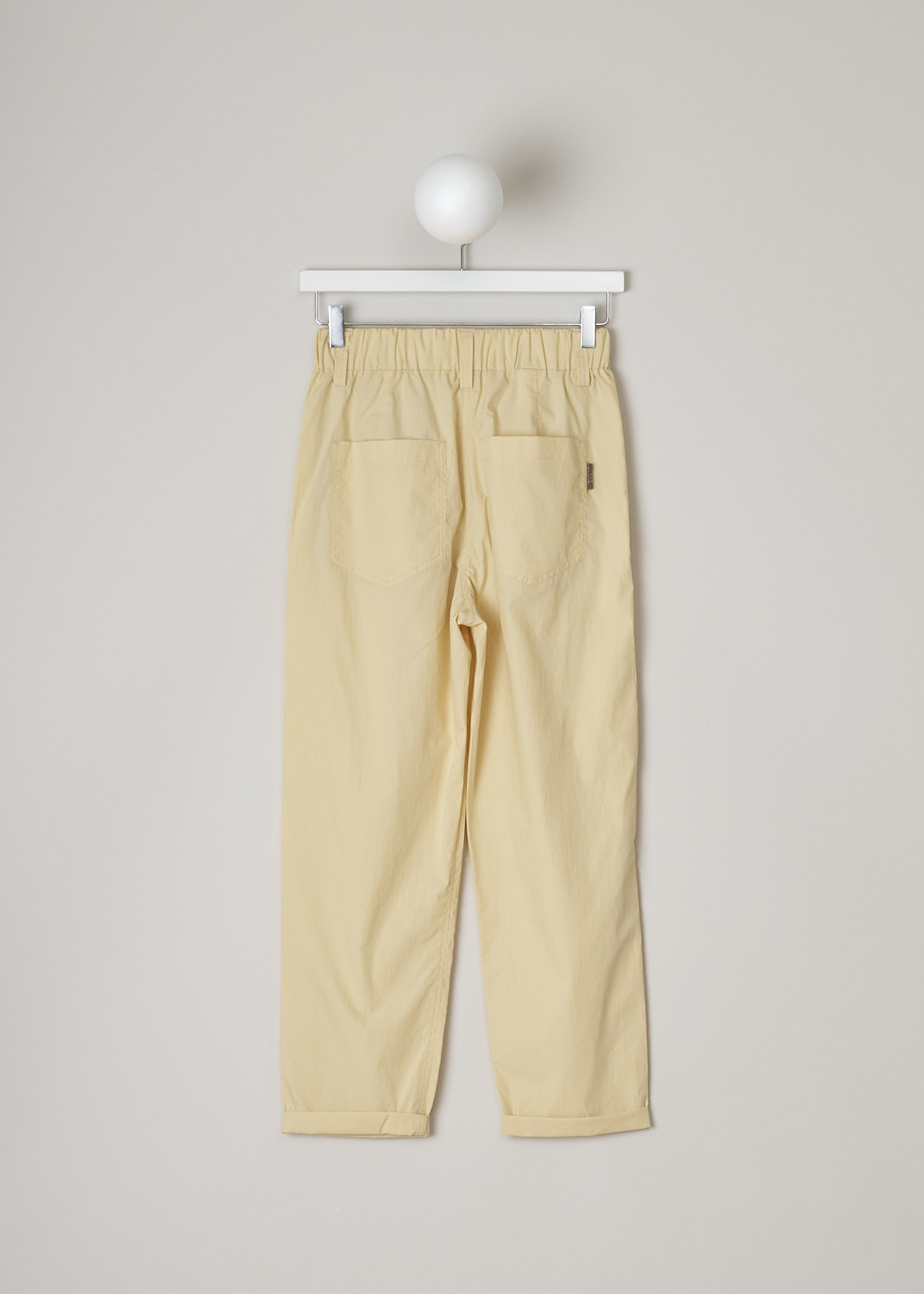BRUNELLO CUCINELLI, PALE YELLOW SLIP-ON PANTS, M0H93P7894_C8612, Yellow, Back, These pale yellow high-waisted slip-on pants have an elasticated waistband with belt loops and a mock-fly stitched on the front. These pants have a traditional five pocket configuration, with two pockets and a single coin pocket in the front and two patch pockets in the back. The straight cropped pant legs have front pleats.  
