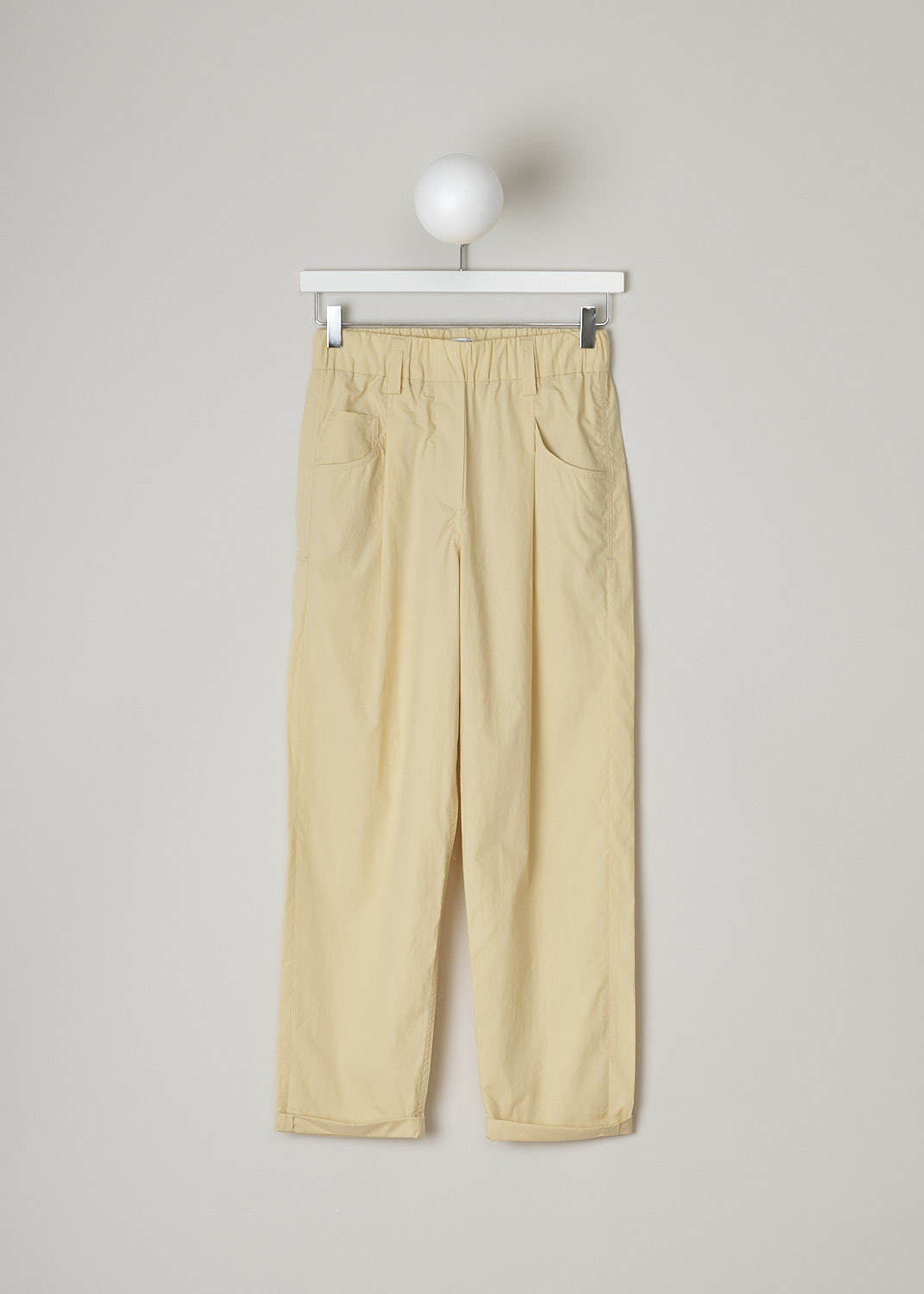 BRUNELLO CUCINELLI, PALE YELLOW SLIP-ON PANTS, M0H93P7894_C8612, Yellow, Front, These pale yellow high-waisted slip-on pants have an elasticated waistband with belt loops and a mock-fly stitched on the front. These pants have a traditional five pocket configuration, with two pockets and a single coin pocket in the front and two patch pockets in the back. The straight cropped pant legs have front pleats.  
