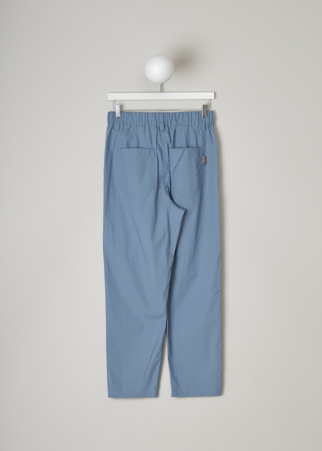 BRUNELLO CUCINELLI, LIGHT BLUE SLIP-ON PANTS, M0H93P7894_C8627, Blue, Back, These light blue slip-on pants have an elasticated waistband with belt loops and a mock-fly stitched on the front. These pants have a traditional five pocket configuration, with two pockets and a single coin pocket in the front and two patch pockets in the back. The straight cropped pant legs have front pleats. 
