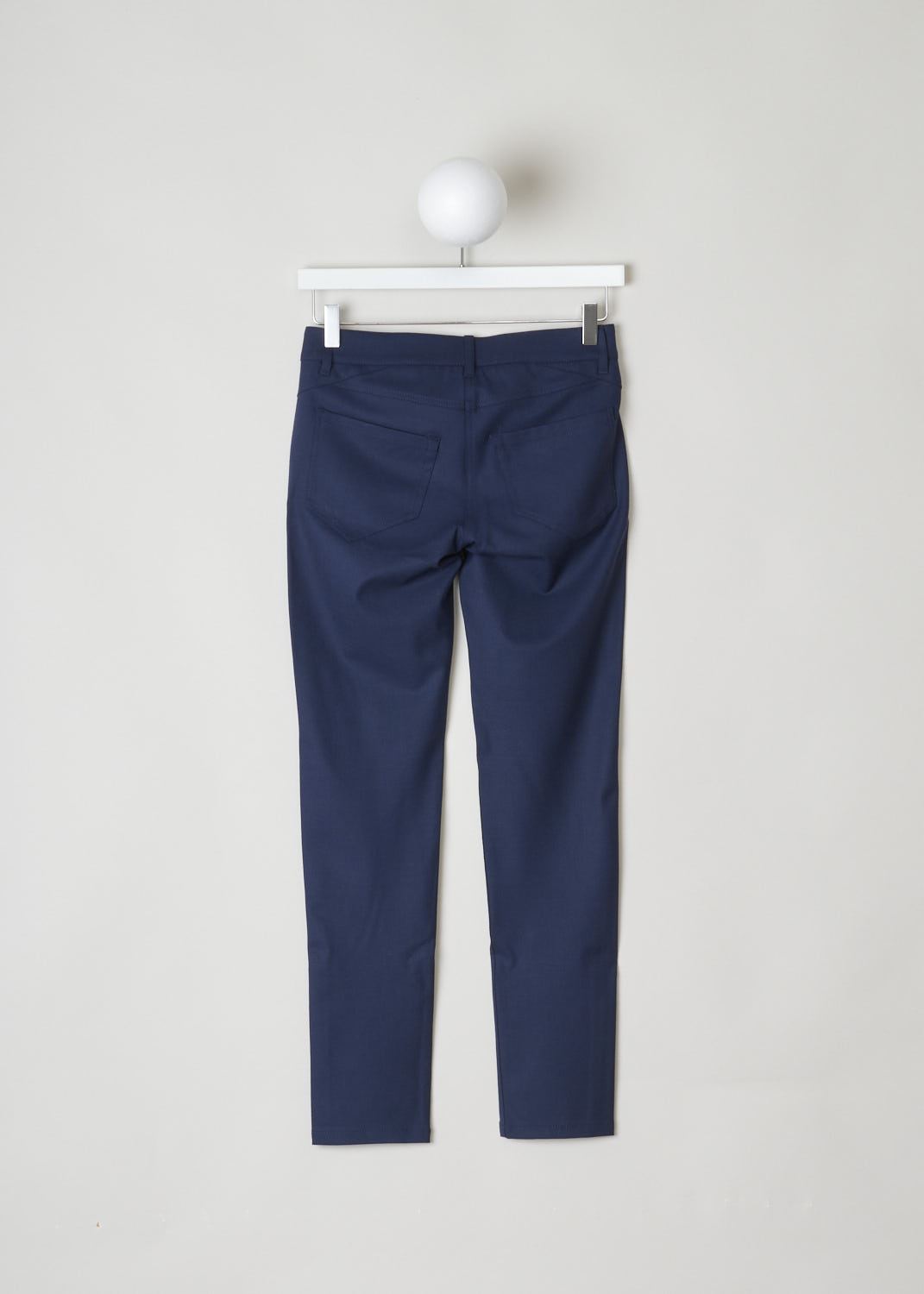 BRUNELLO CUCINELLI, NAVY BLUE WOOL PANTS, M0L15P1790_C2632, Blue, Back, Form fitting dark blue pants made with a wool blend. These pants have a waistband with belt loops and a single button and concealed zipper closure. These pants have a traditional five pocket configuration, meaning in the front there are two rounded pockets and a single coin pocket, and two pockets in the back.
