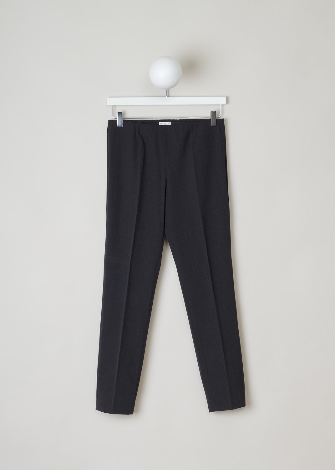 Brunello Cucinelli, straight charcoal pants, MA051P1794_C004, grey, front, Empower your outfit with these minimalistic designed pants. Comes in a lightweight wool in charcoal grey and midnight blue. These low-cut pants have a slim fit and slightly tapered legs.
A concealed elasticated waistband and closes with an invisible zip on the side.