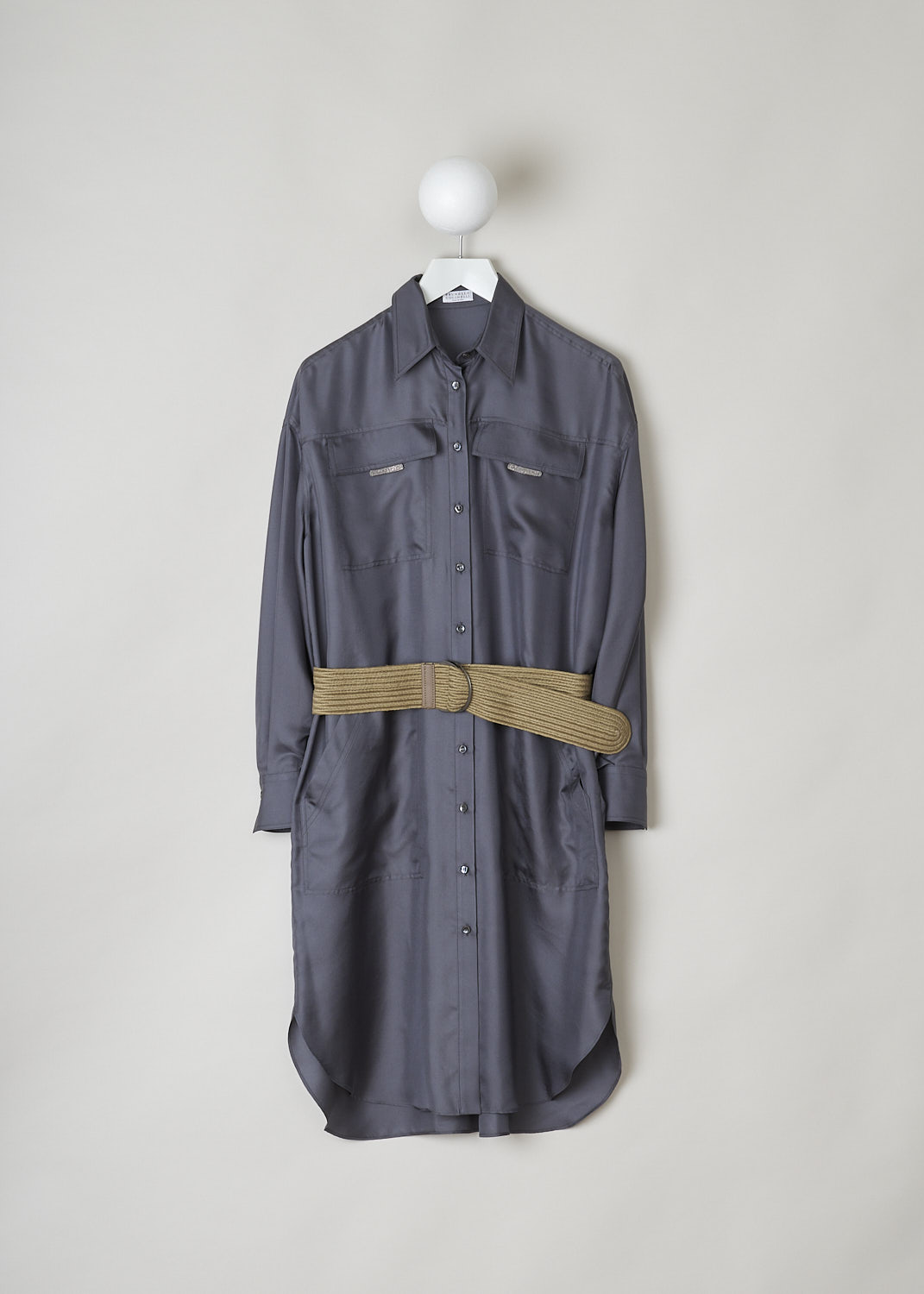 BRUNELLO CUCINELLI, ANTHRACITE SHIRT DRESS WITH BRAIDED BELT, MB953MY306_C079, Grey, Front, This wide anthracite shirt dress has a classic collar a front button closure. The long sleeves have buttoned cuffs. The dress has four stitched on pockets: two monili decorated breast pockets with flap and two slanted patch pockets. The dress has a rounded hemline with an asymmetrical finish, meaning the back is a little longer than the front. The dress comes with braided belt.
