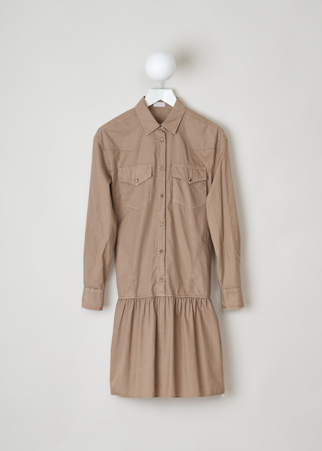 Brunello Cucinelli, Brown shirt dress, ML680AR321_C6067, brown, front, Brown shirt dress with a dropped waist. This cotton dress features a pointed collar, long sleeves with cuffs, which close with a single button. The signature, monili beads, on this model adorn the breast pockets. Your closing option is the buttons on the front.