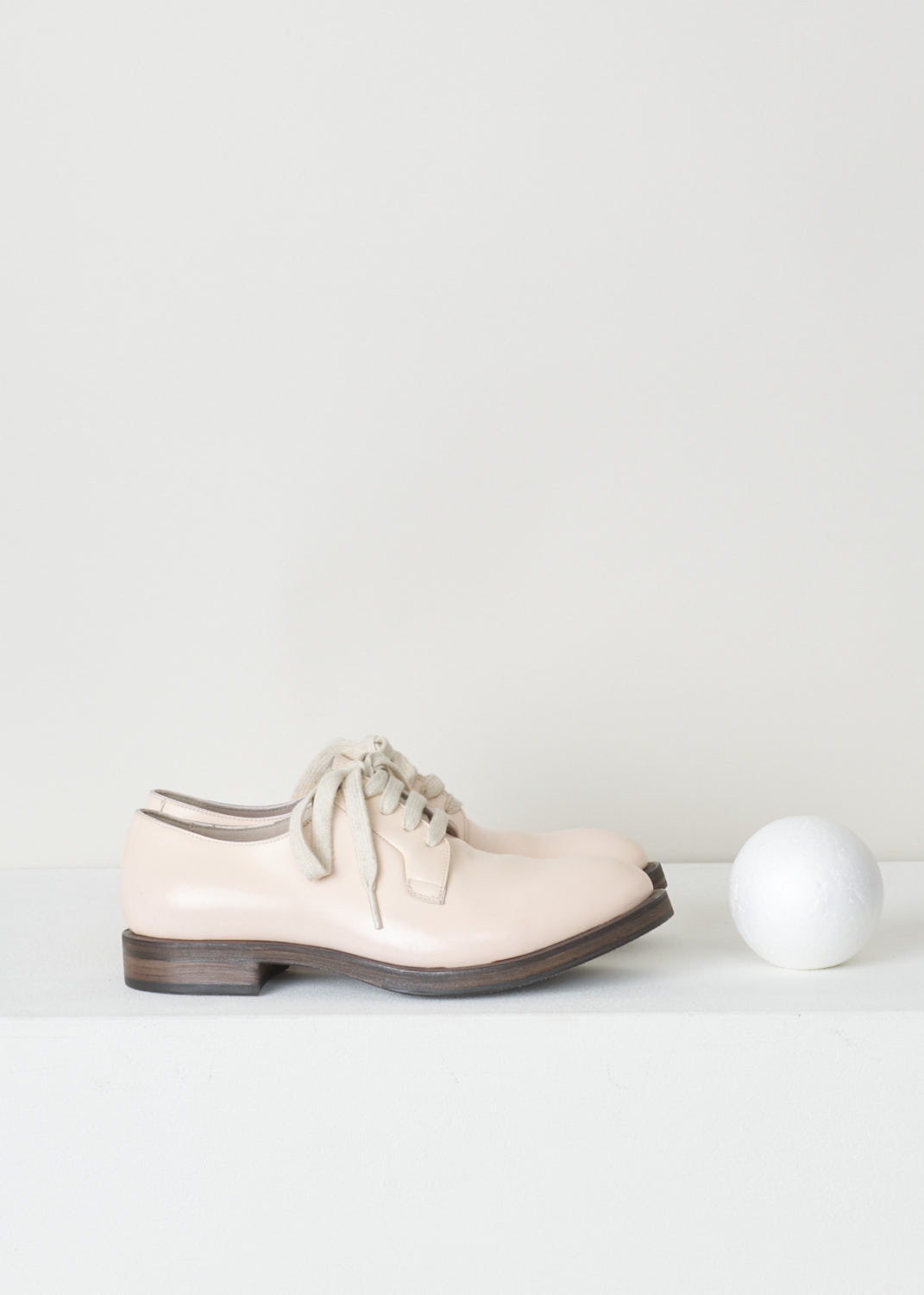BRUNELLO CUCINELLI, BLUSH PINK DERBY SHOES, MZDVLC113_C6203, Pink, Side, Pale blush pink leather derby shoes with a shiny finish. This model has a classic lace-up closure. These shoes have a rounded toe. The sole is a contrasting dark brown color. 

Heel height: 1.5 cm / 0.5 inch 
