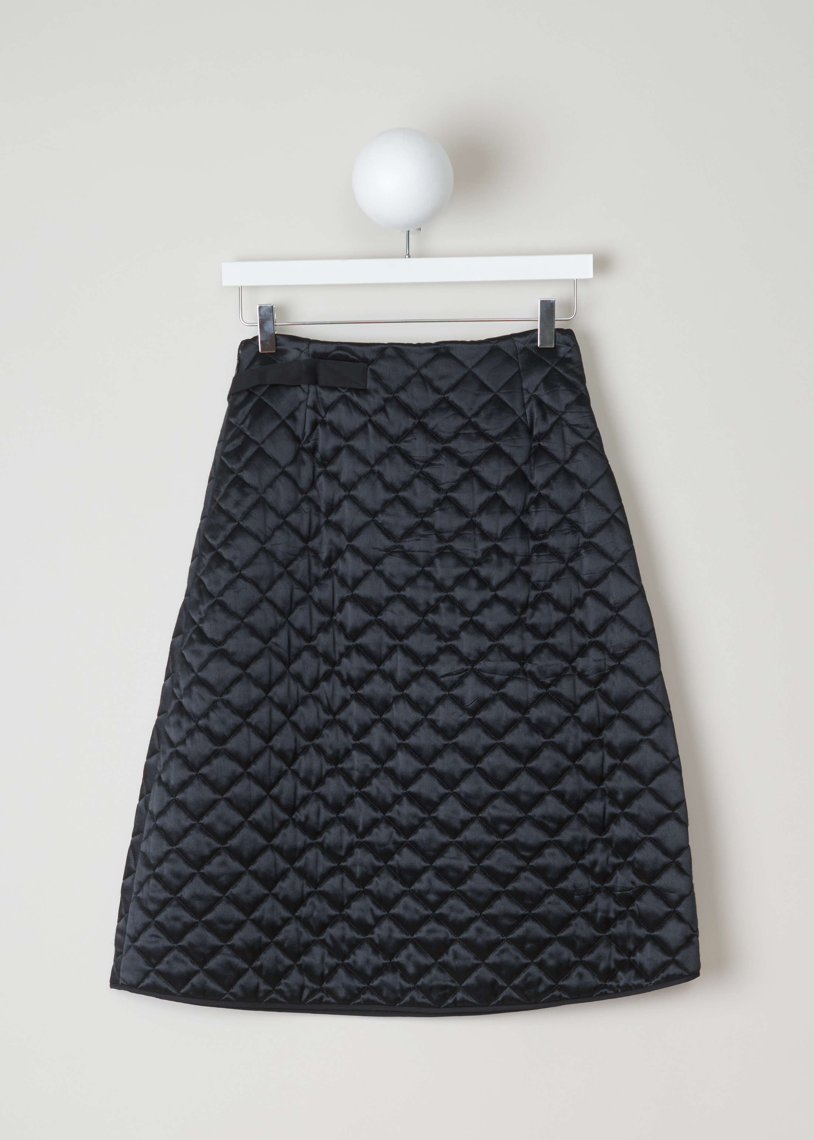 CÃ©line Quilted skirt 6563_22M90_0N0 black back. Black quilted A-line skirt with bow detail and zip fastening on the side.
